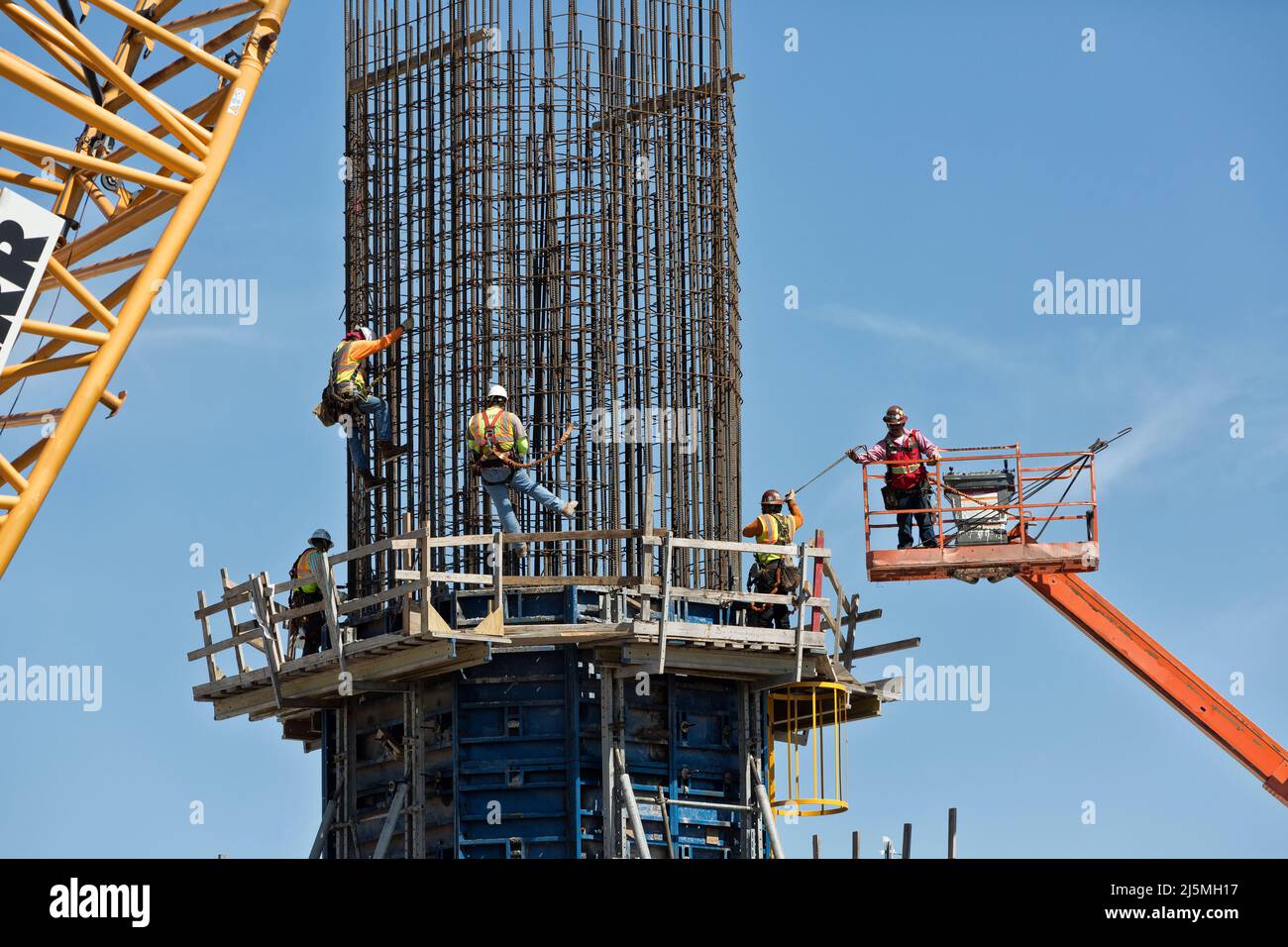 New Corpus Christi Harbor Bridge construction, technicians tying rebar.   Texas. Stock Photo