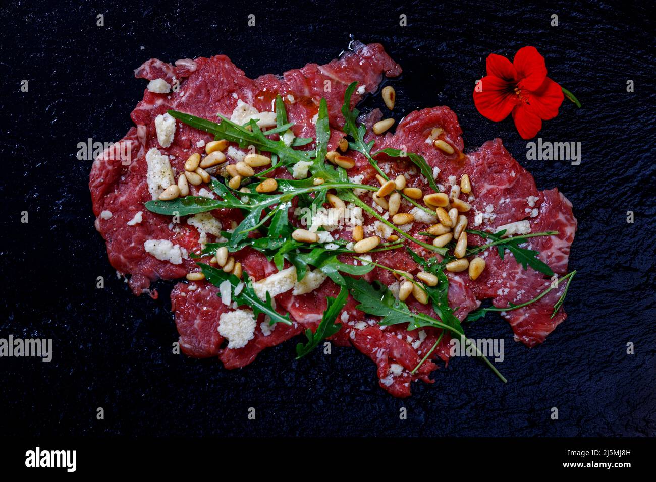 carpaccio con rucola e grana