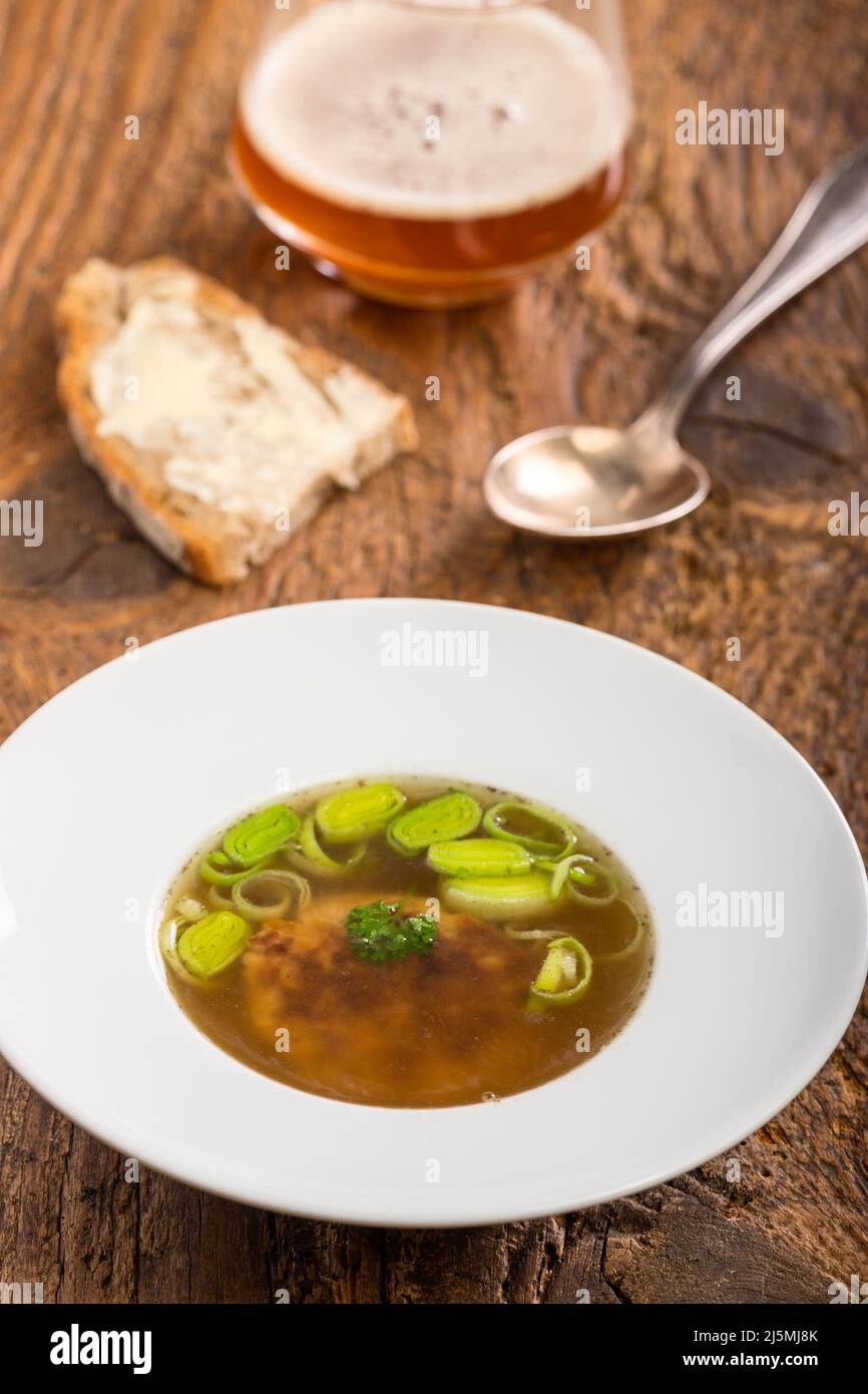 austrian cheese dumpling soup on wood Stock Photo