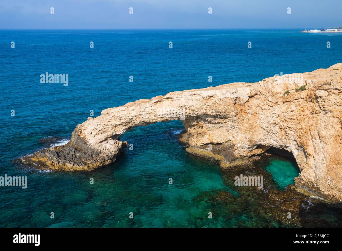 Stone arch known as the Love bridge. Popular natural landmark of Ayia