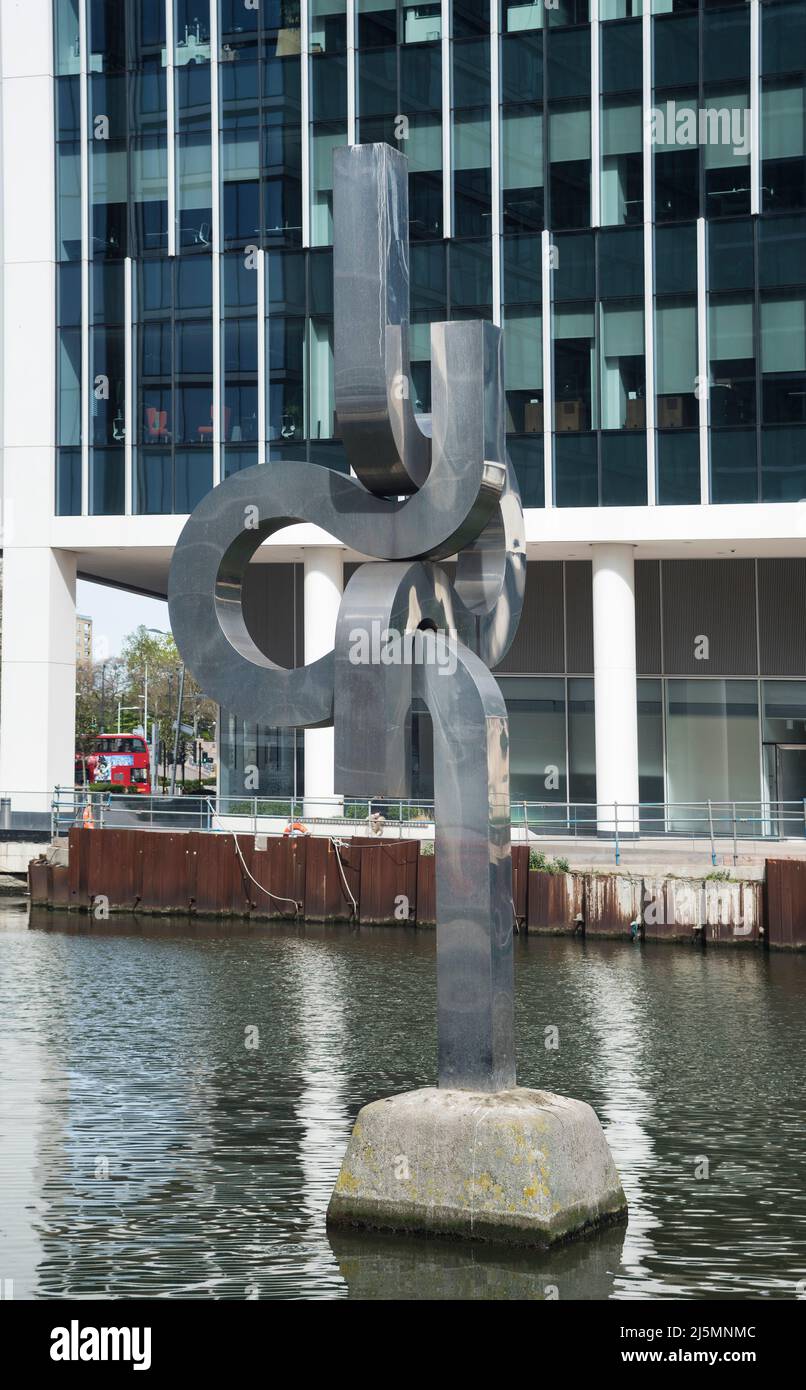Modern art sculpture set in a docklands development. Stock Photo