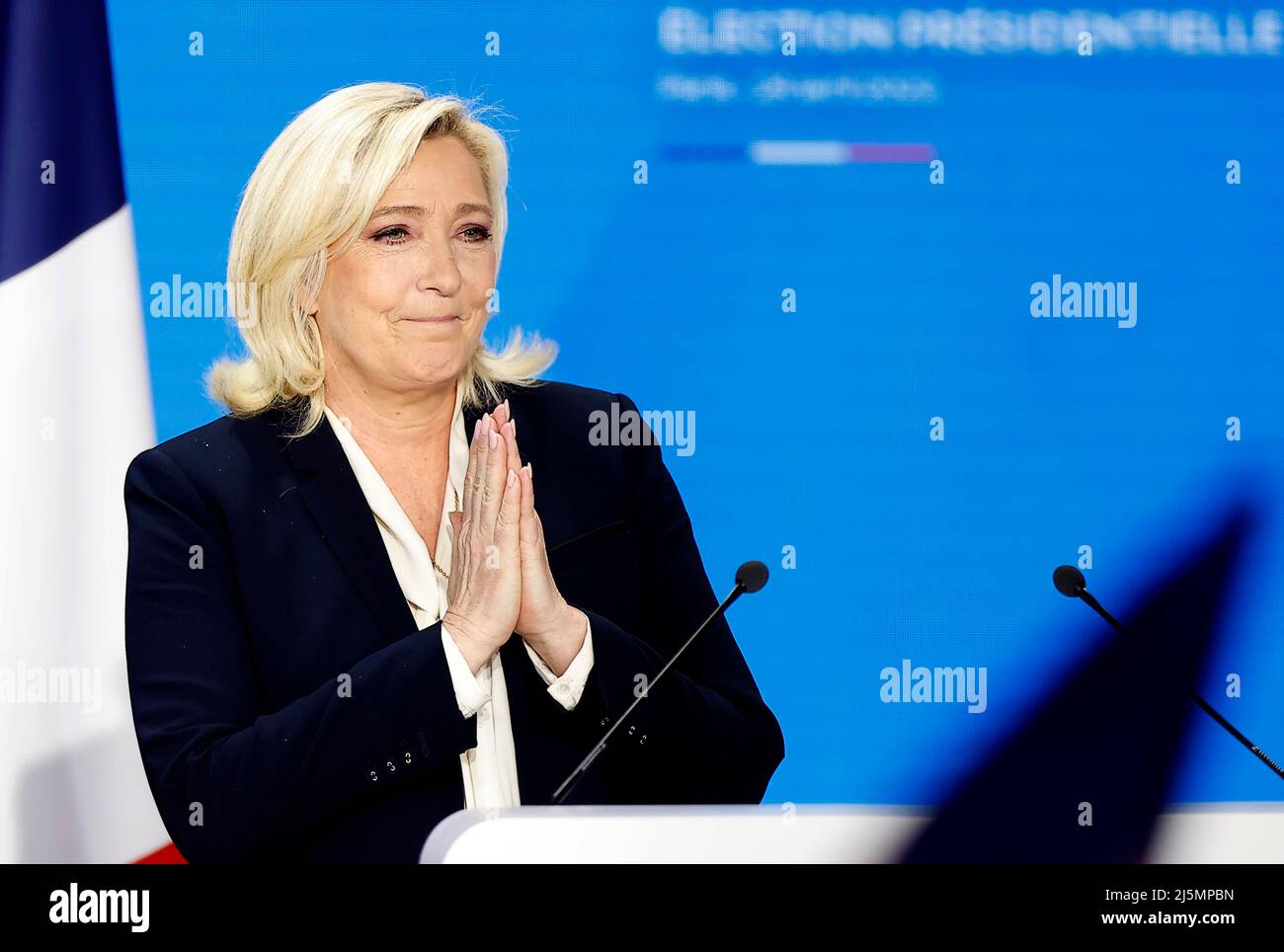 Paris, France. 24th Apr, 2022. Marine Le Pen, candidate of the far-right National Rally party, attends a rally after the presidential runoff in Paris, France, on April 24, 2022. French incumbent President Emmanuel Macron won the 2022 French presidential runoff with 58 percent of the votes, according to the preliminary exit poll released Sunday evening by French television BFMTV. Macron's rival, far-right wing candidate Marine Le Pen, gained 42 percent of the votes. Credit: Xinhua/Alamy Live News Stock Photo