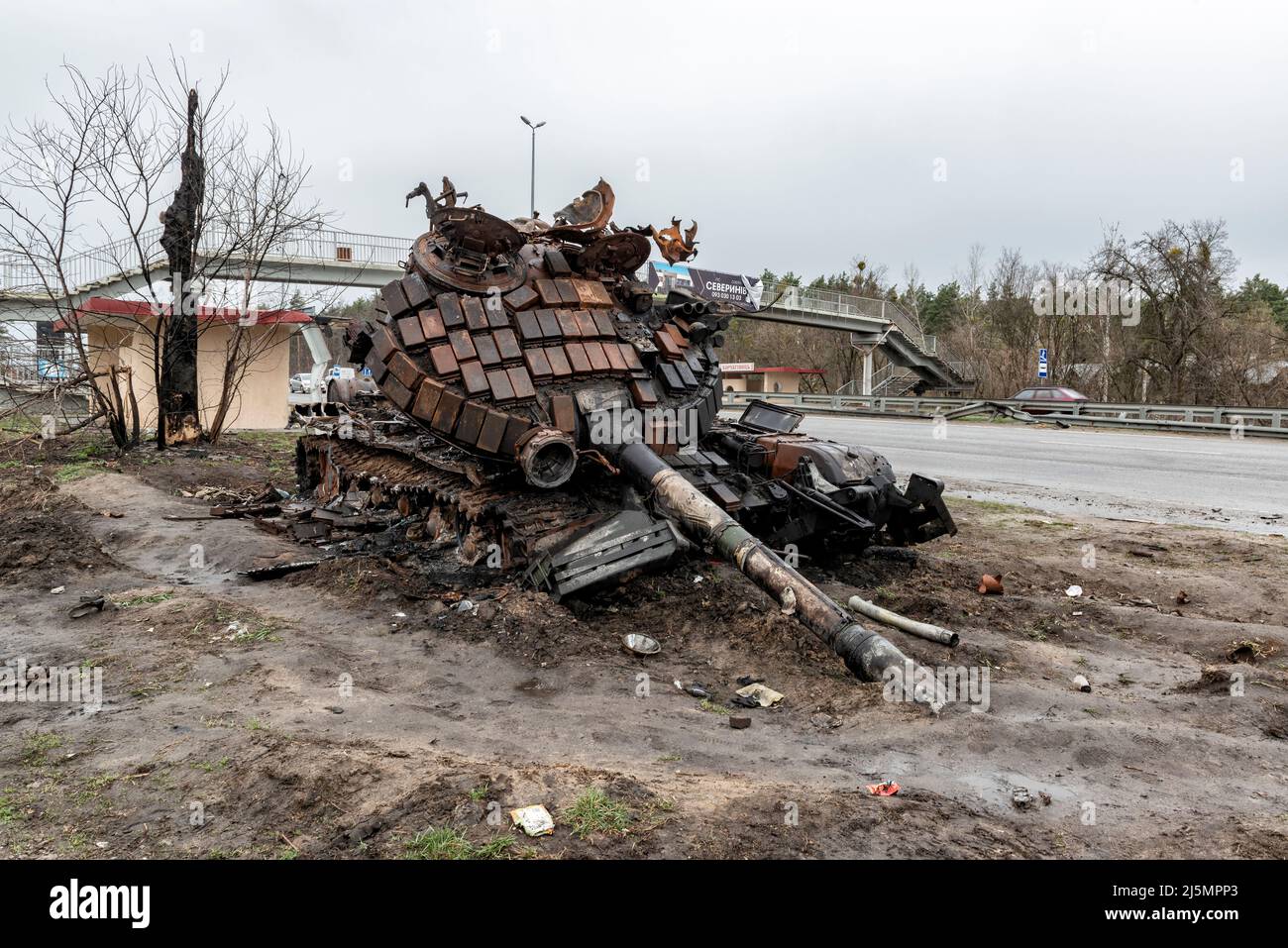 2022-04-09 Kyiv region, Ukraine. Destroyed russian tank on the side of the E40 road. War in Ukraine Stock Photo