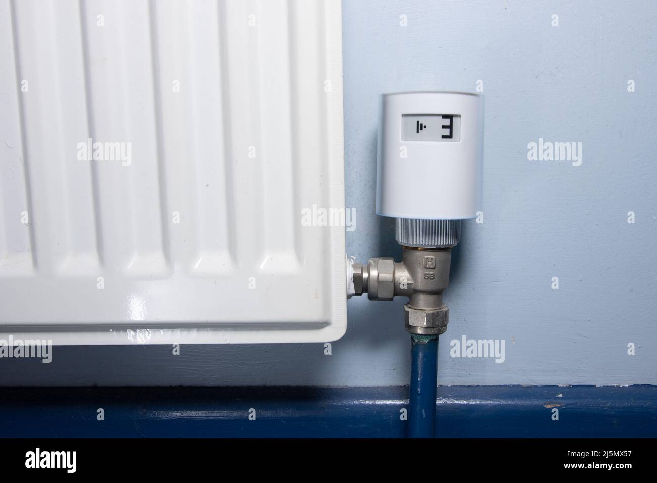 A smart radiator valve connecting to wifi Stock Photo