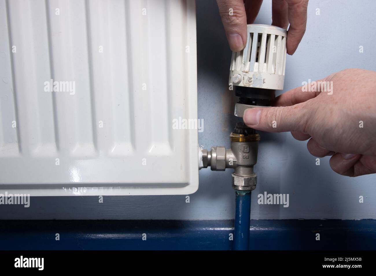 Removing an radiator valve Stock Photo Alamy
