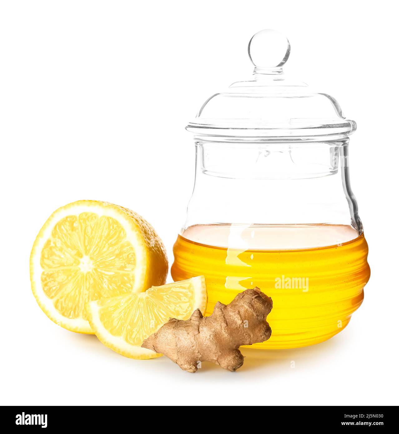 Glass bowl with honey, ginger and lemon for sore throat on white