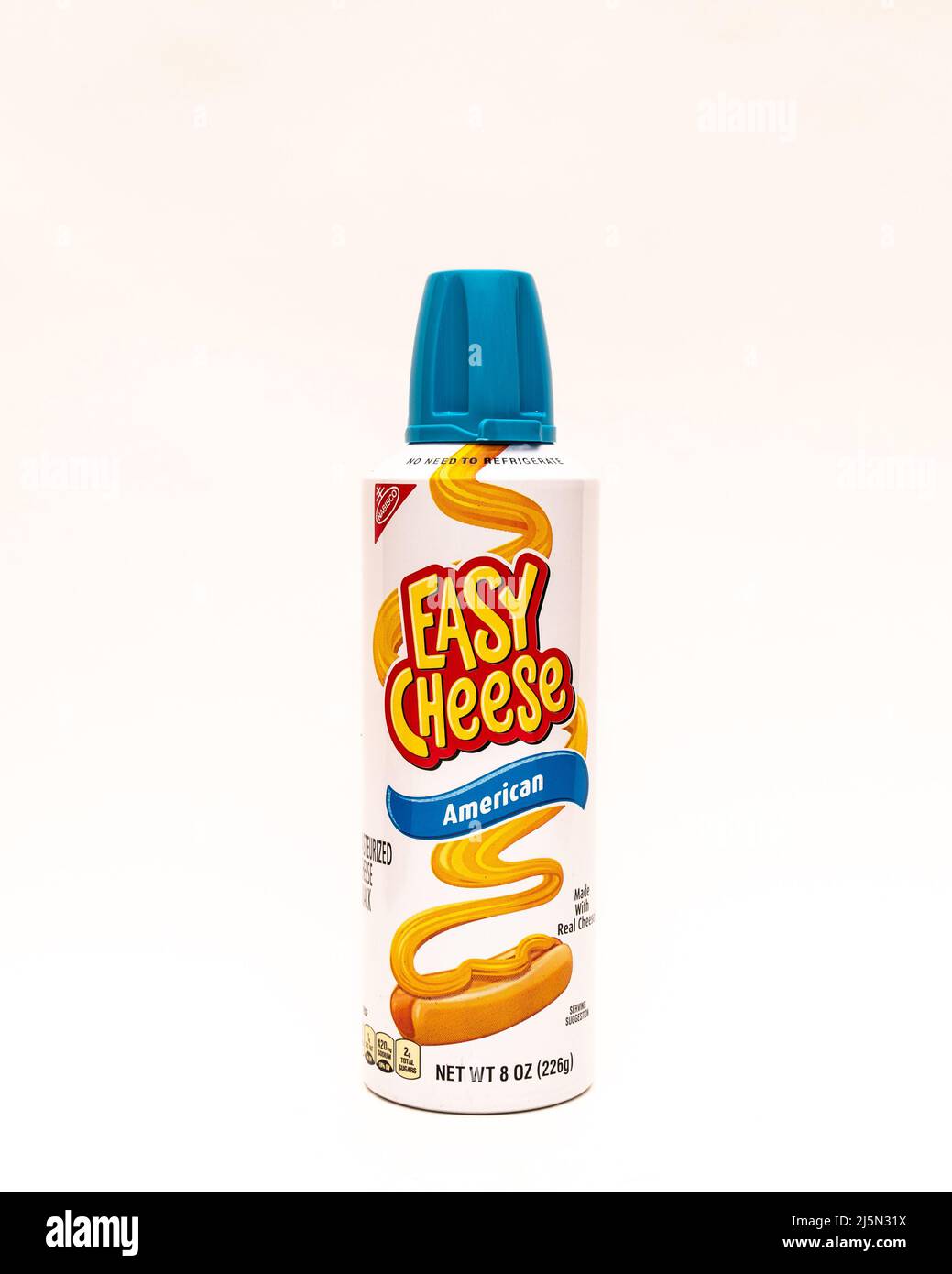 A pressurized can or American flavor Easy Cheese, just squirt it onto a cracker for an instant delicious snack. Stock Photo