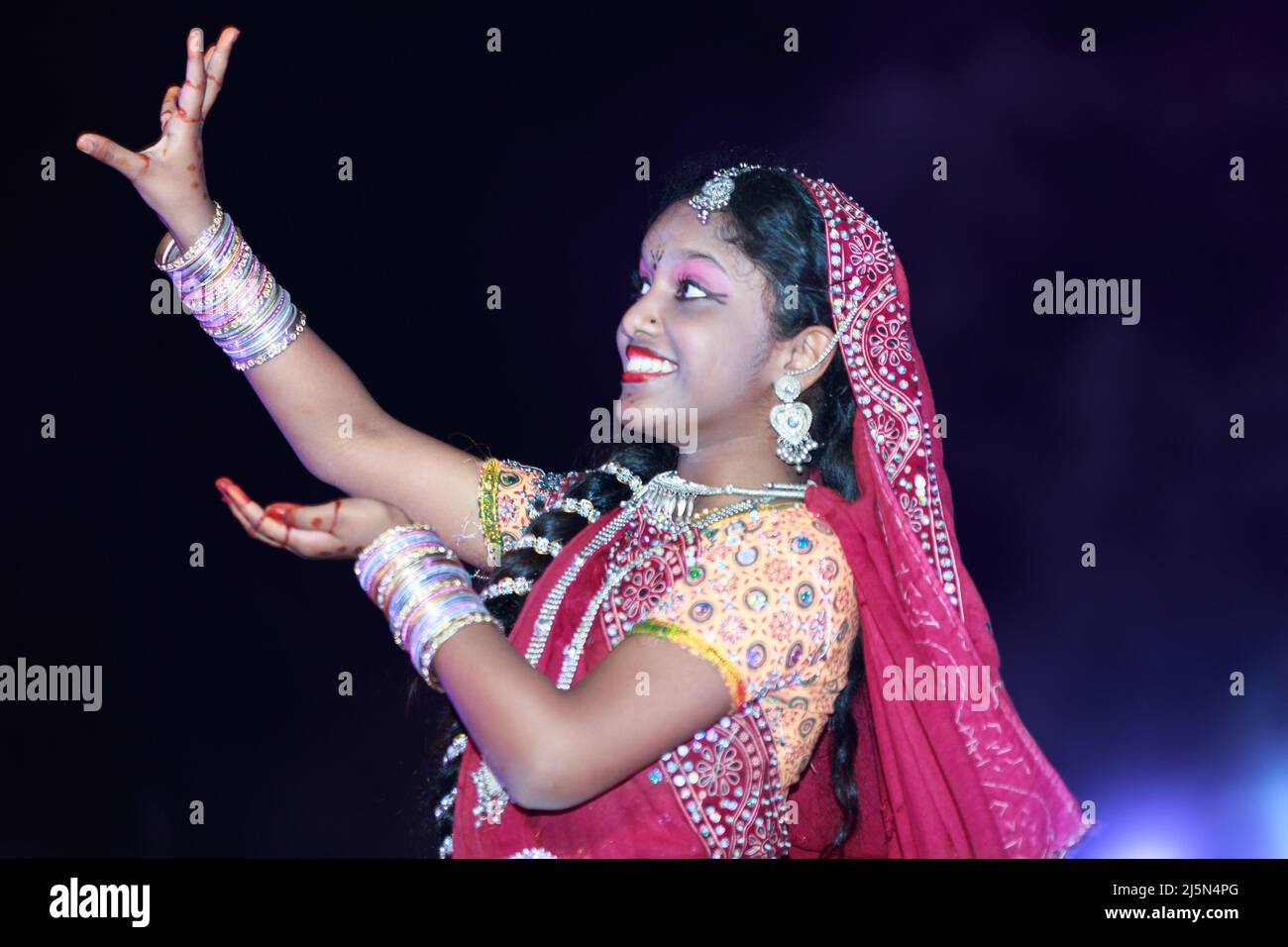 Traditional Indian dancers performing on stage in Katara cultural village, Doha Qatar Stock Photo