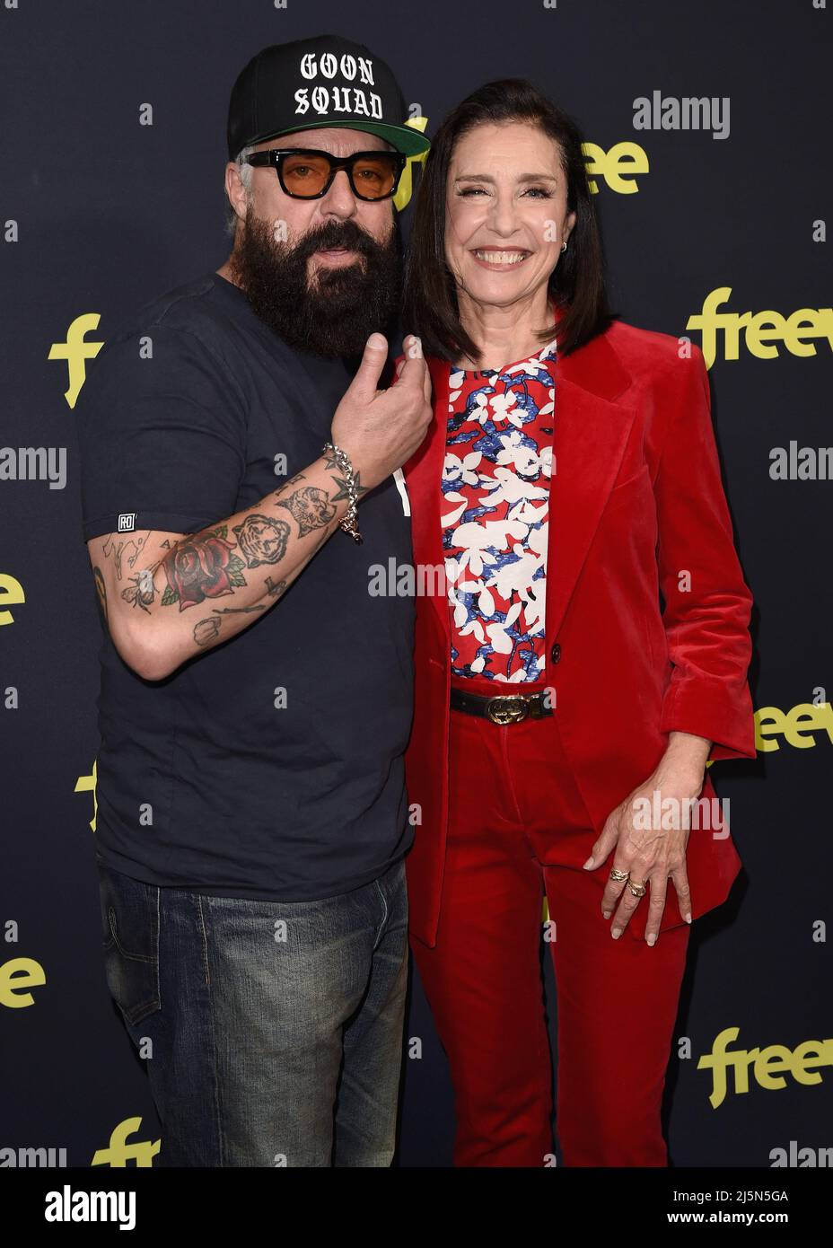 Titus Welliver and Mimi Rogers walking on the red carpet at the Los Angeles  premiere of Bosch: Legacy at The London West Hollywood in Los Angeles, CA  on April 24, 2022. (Photo