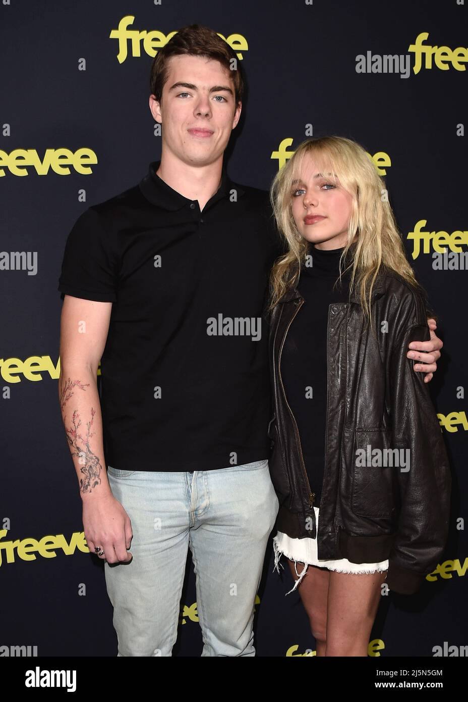 Eamonn Welliver and Cora Welliver walking on the red carpet at the Los