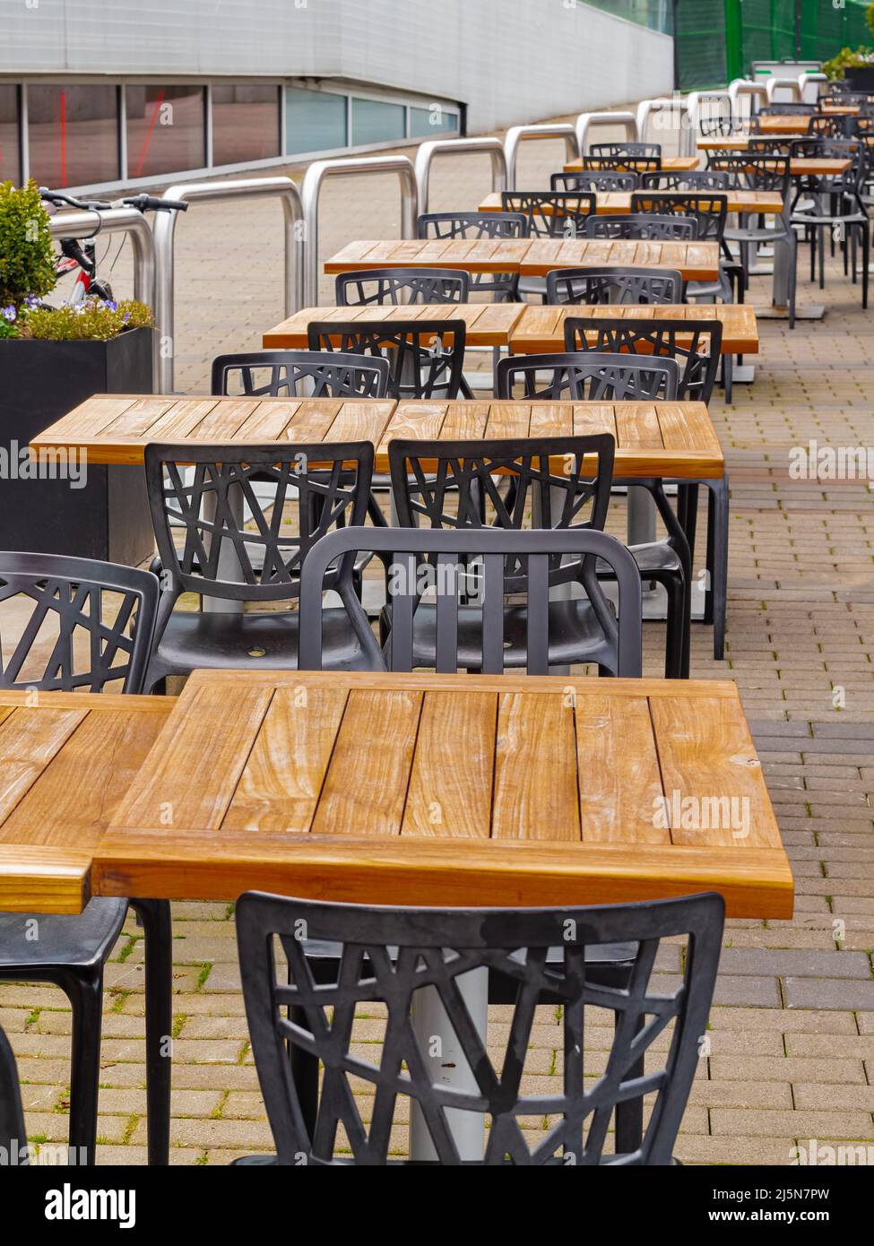 View of empty outdoor cafe in Vancouver BC. Open air cafe with chairs