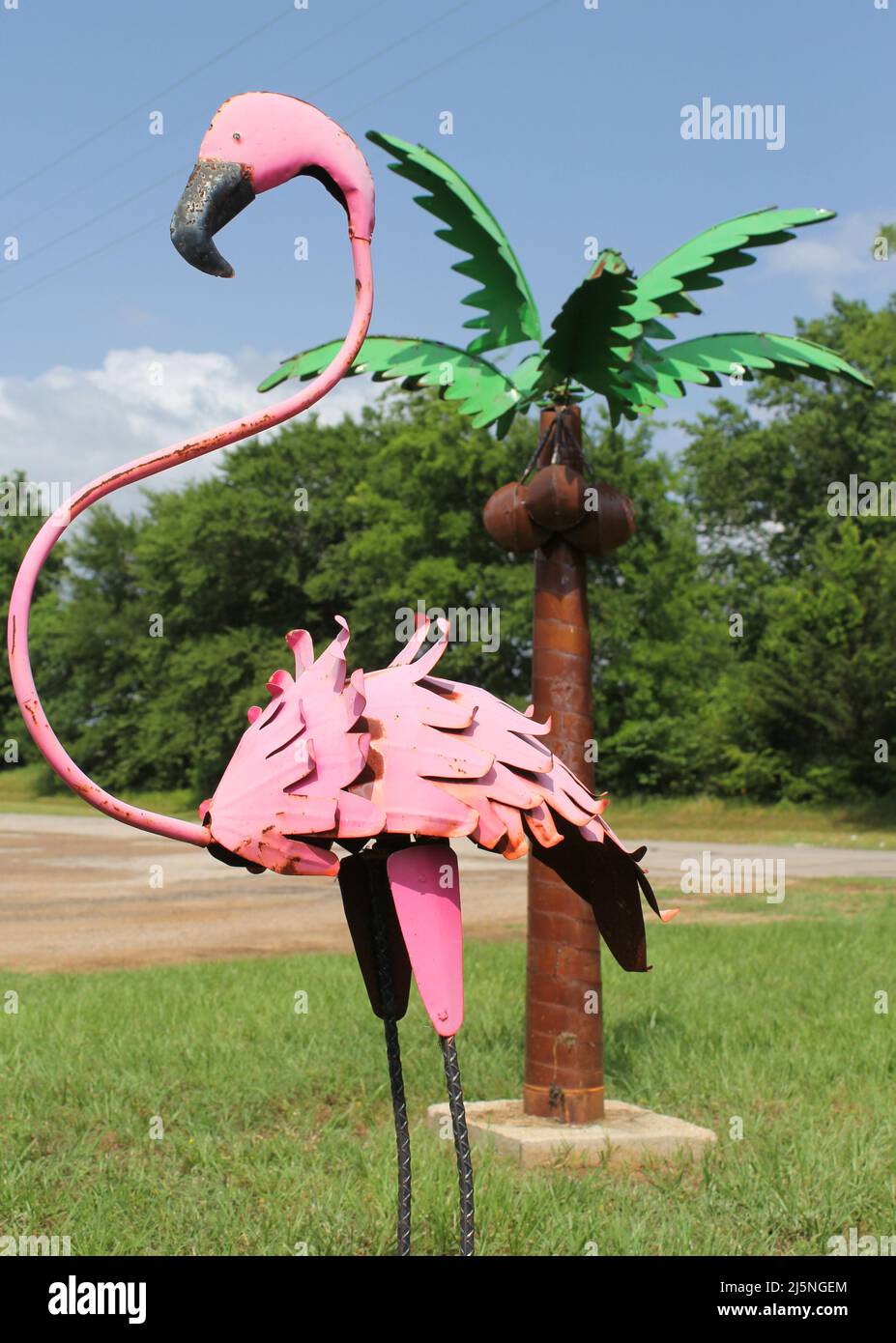 Pink Flamingo and Palm Tree Metal Garden Ornaments Stock Photo - Alamy