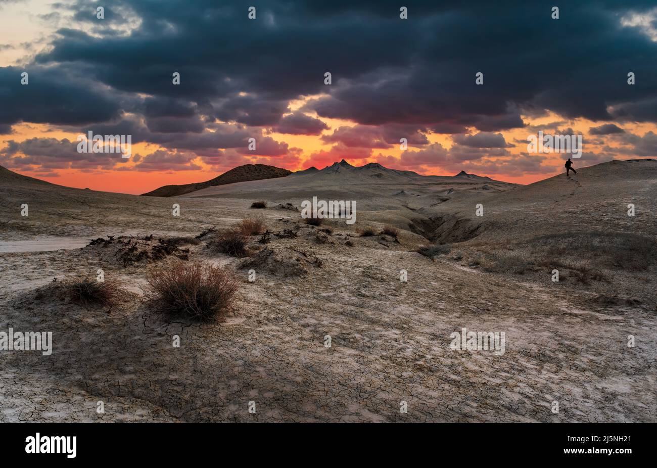 Landscape with mud volcanoes in the mountains at sunset Stock Photo