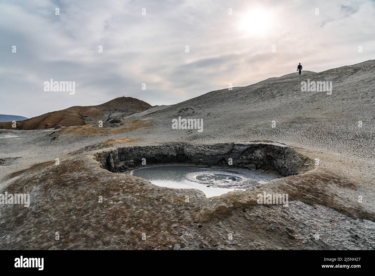 Mud volcano in mountains. Amazing natural phenomenon of the earth Stock Photo