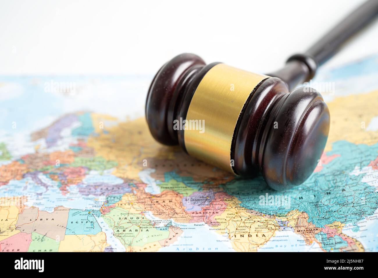 Bangkok, Thailand - December 1, 2021 Asia, Gavel for judge lawyer on world globe map. Law and justice court concept. Stock Photo