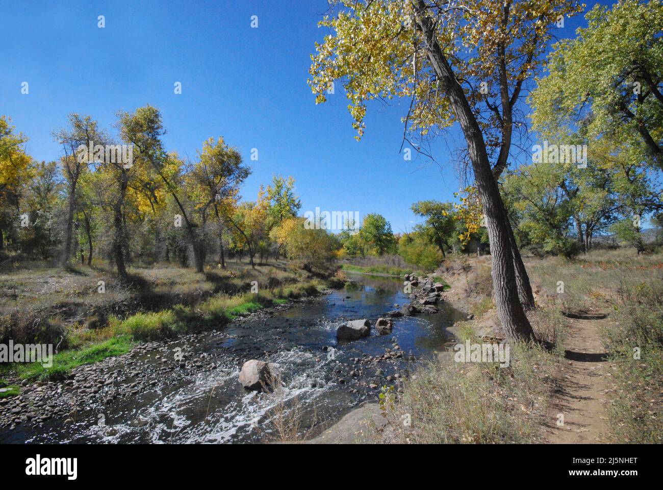 Clear Creek running through Prospect Lake Park in Wheat Ridge Colorado Stock Photo