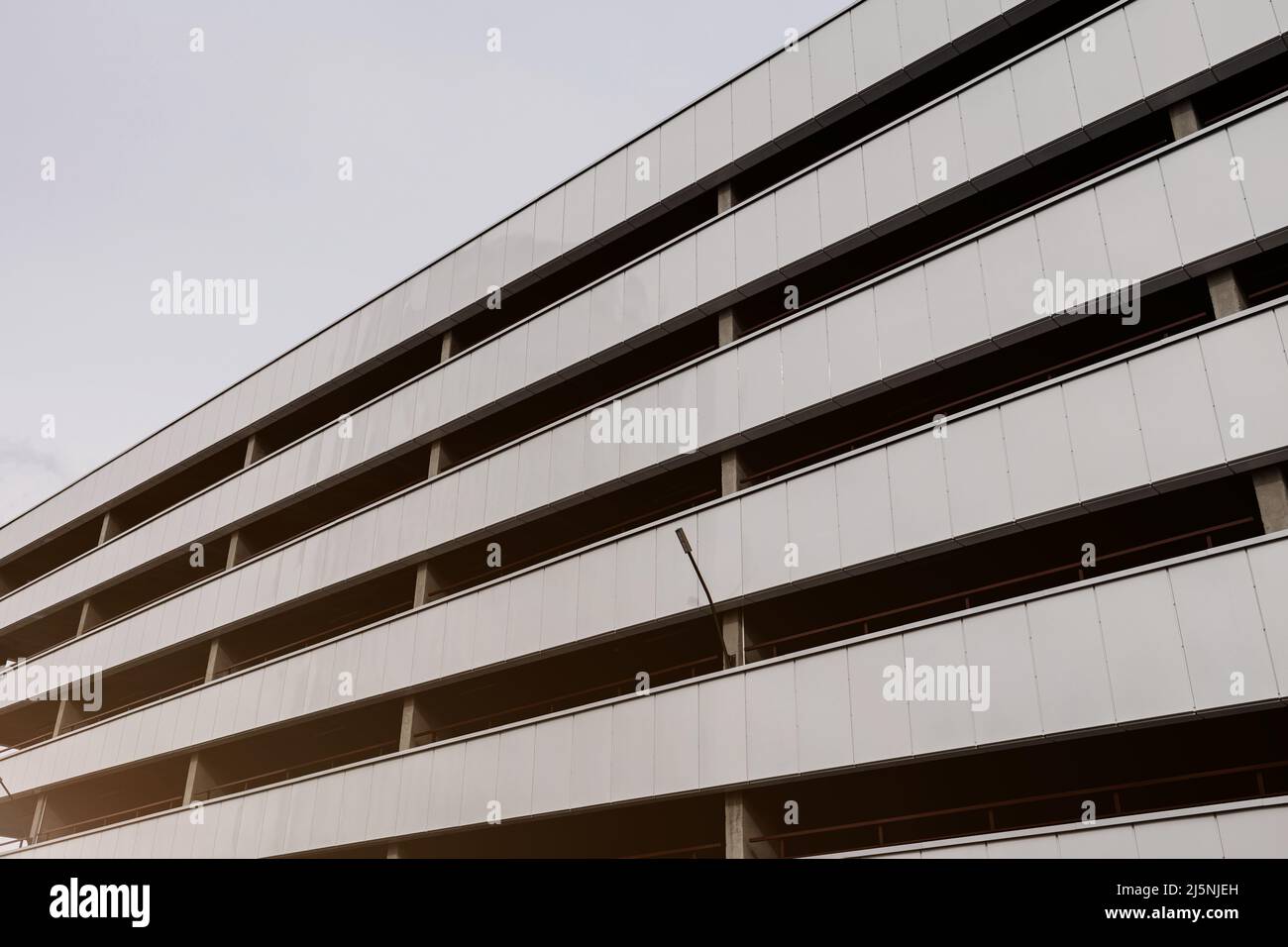 typical multi level parking garage facade and exterior. Stock Photo
