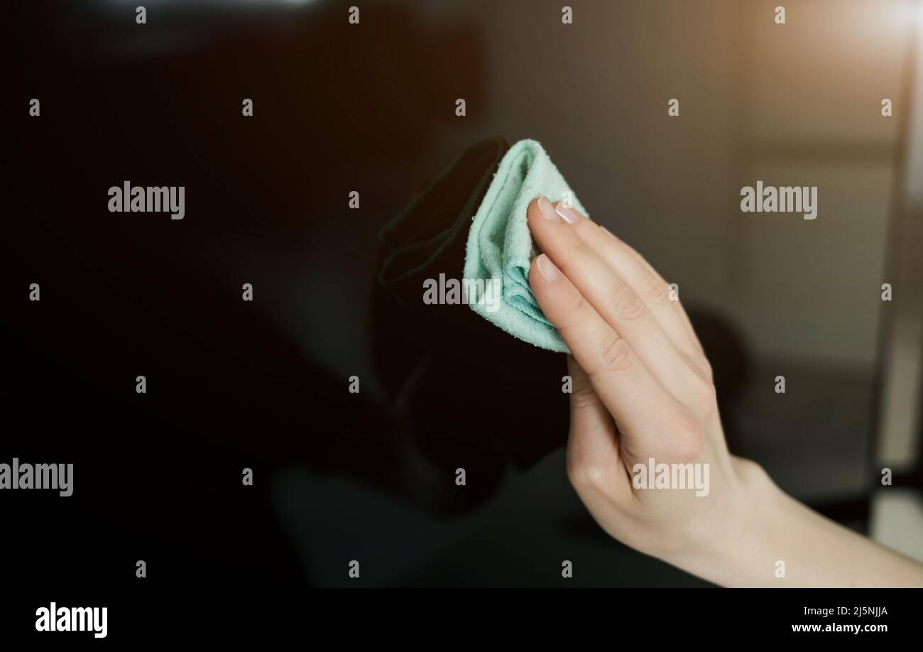 House cleaning. Dusting on household appliances. TV cleaning. Cleaning