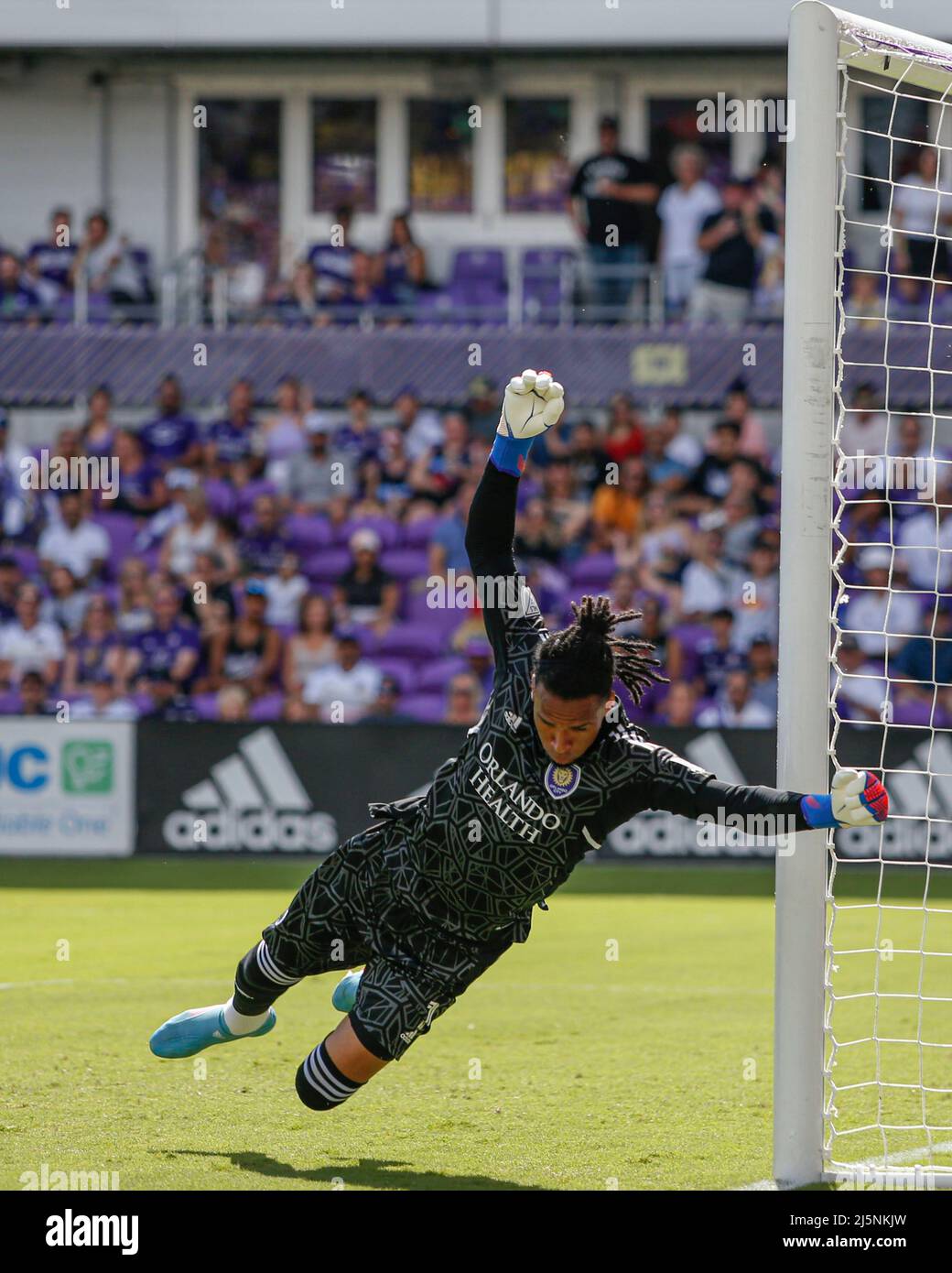 Orlando, FL:  Orlando City goalkeeper Pedro Gallese (1) knocks the ball away during an MLS game against the New York Red Bulls, Sunday, April 24, 2022 Stock Photo