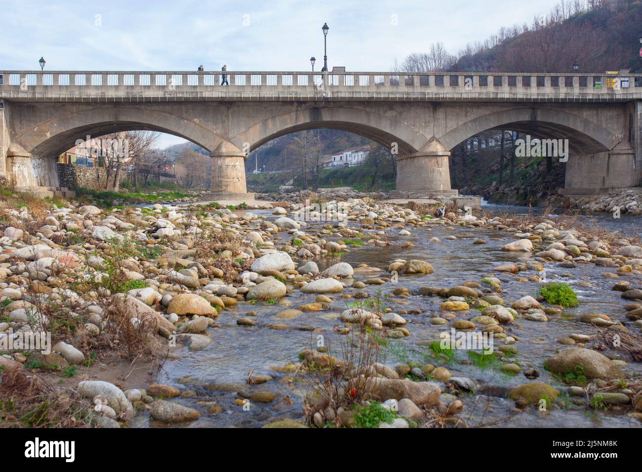 Navaconcejo old bridge, Puente Viejo on winter. Caceres, Extremadura, Spain Stock Photo