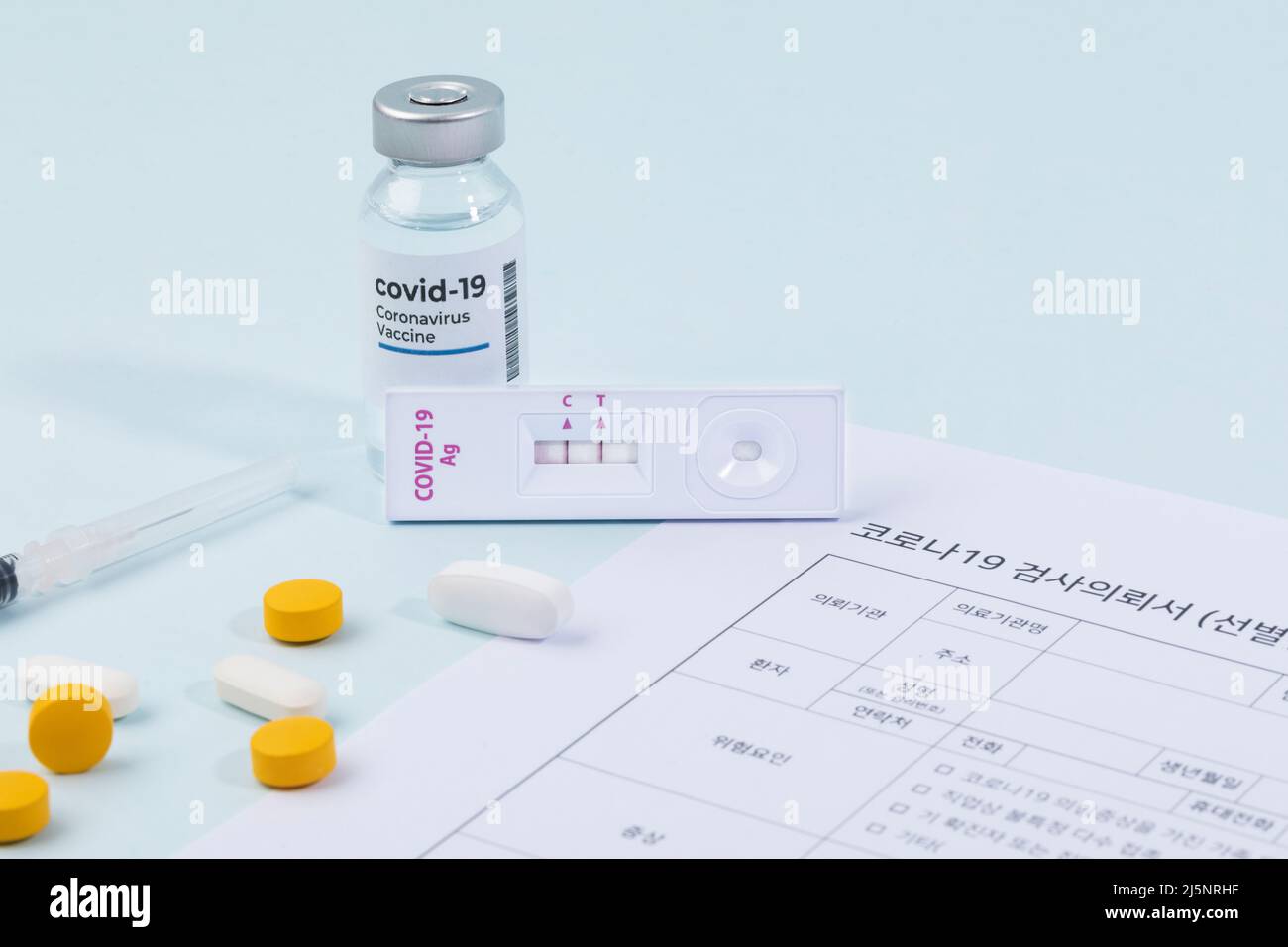 covid testing kit and test application form of suspected covid patient Stock Photo