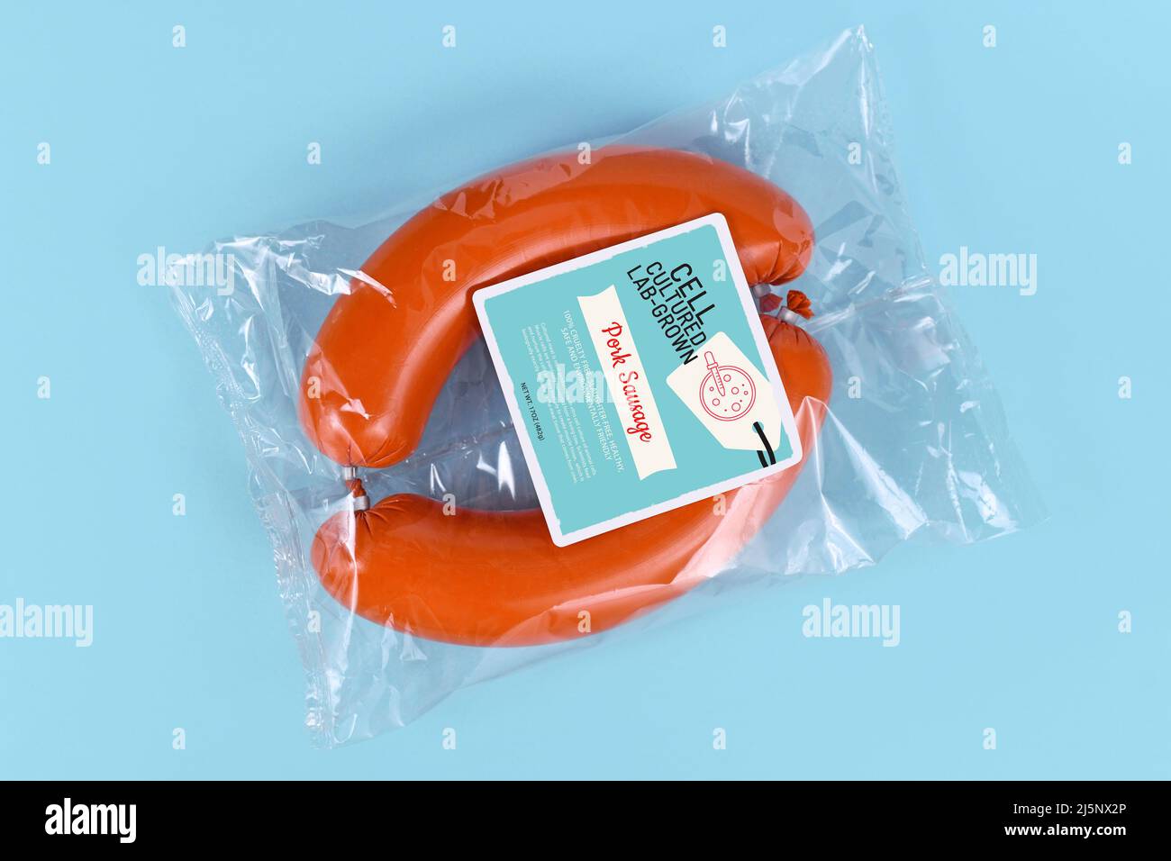 Lab grown cell cultured meat concept for artificial meat showing packed pork sausages with made up label Stock Photo