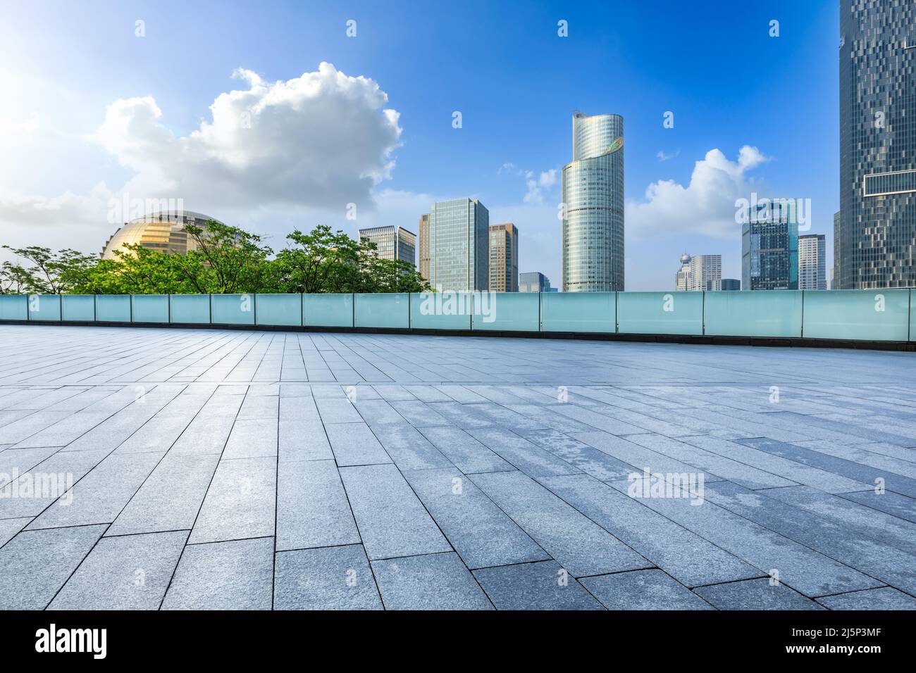 Empty square floor and city skyline with modern commercial buildings in Hangzhou, China. Stock Photo