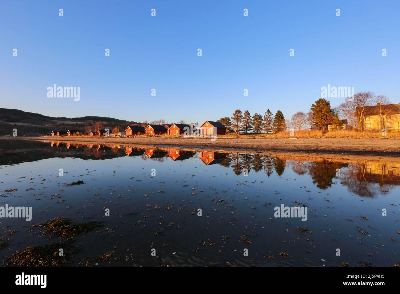 Oesand Norway 04/23/2022 Camping on the beach Oesand located near the city  Trondheim, reflecting in the water during low tide at Trondheim fjord Stock  Photo - Alamy