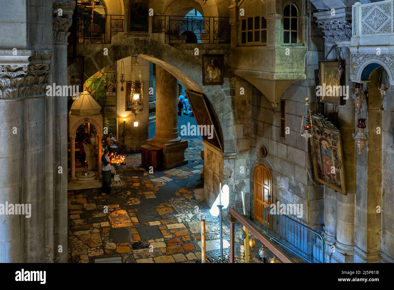 People inside of the Church of the Holy Sepulcher in Old City of Jerusalem, Israel. Stock Photo