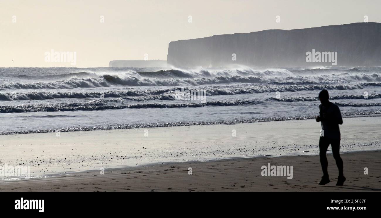 Big waves at Filey Bay, with Bempton Cliffs behind, Yorkshire east coast, northern England, UK Stock Photo