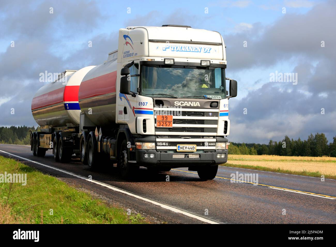 164G Scania tank truck at speed hauling ADR 99-3257, Elevated temperature liquid along road E63 in Jämsä, Finland. August 23, 2018. Stock Photo