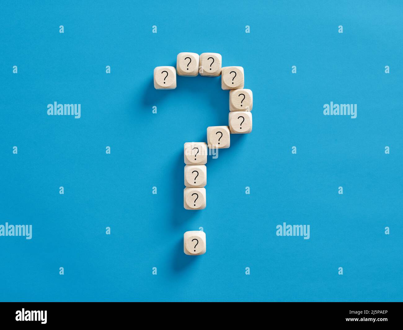 Question mark symbol made with wooden cubes. Stock Photo
