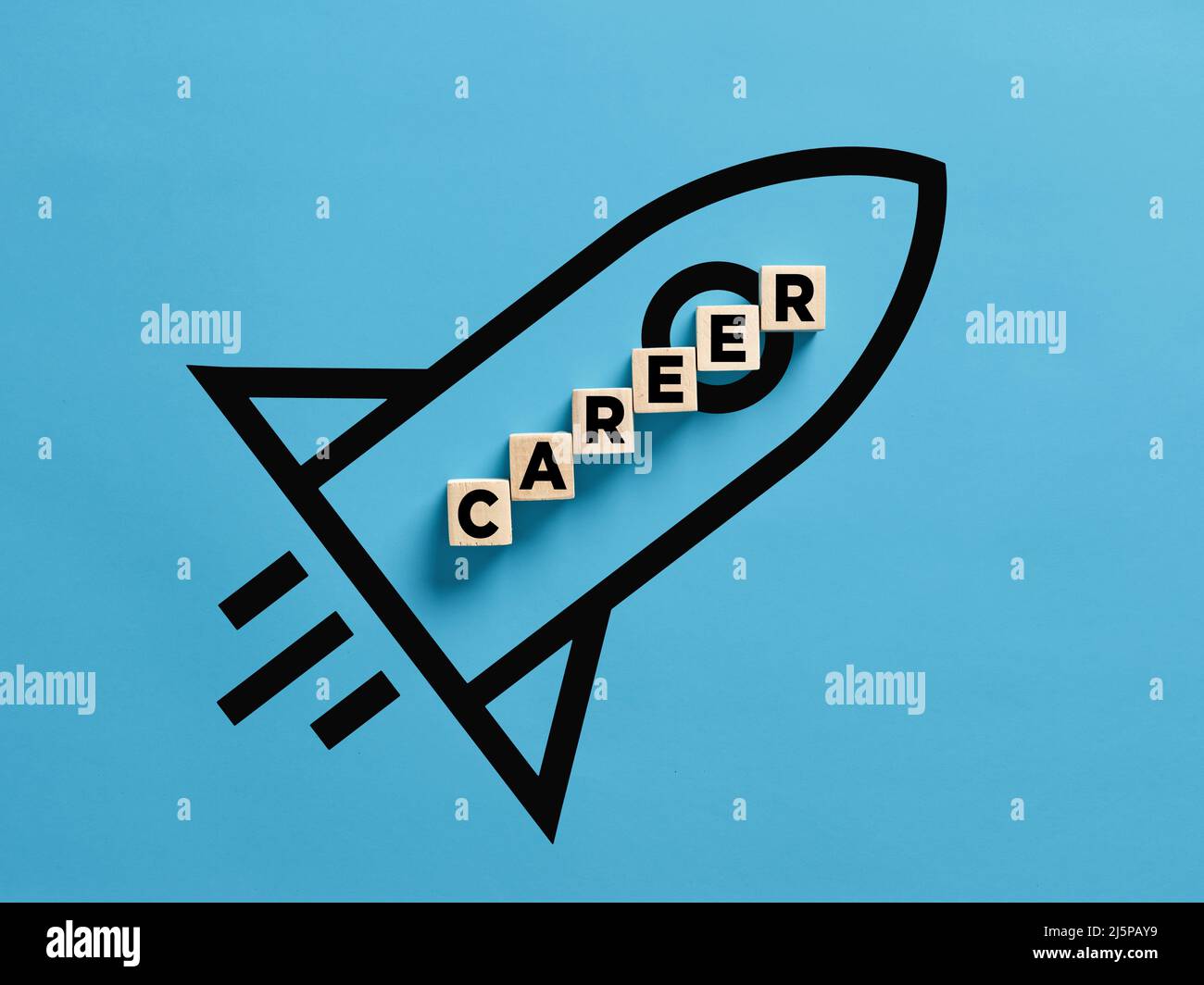 The word career on wooden cubes with a rocket at the background. Business career advancement or promotion concept. Stock Photo
