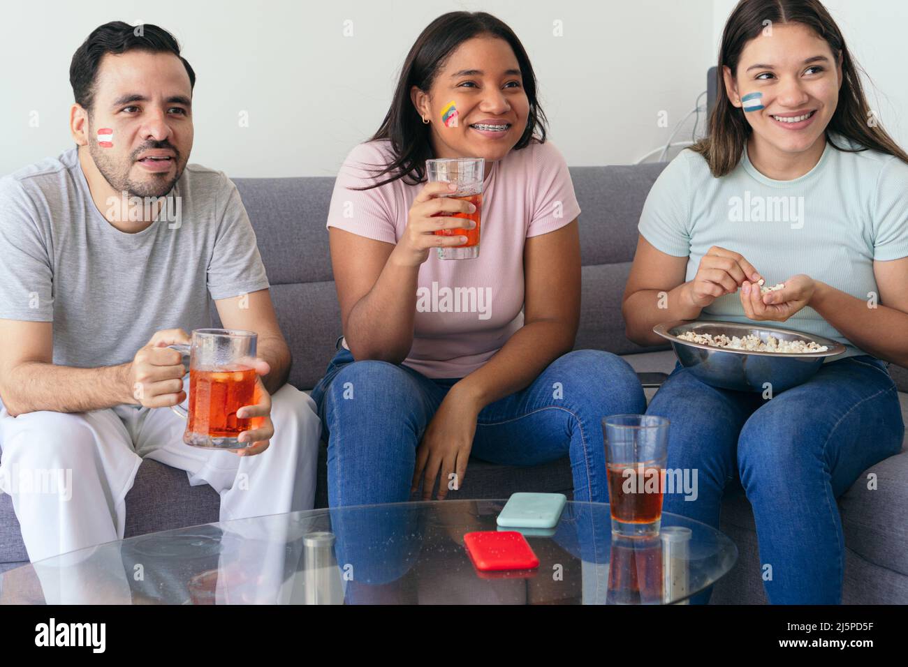 Soccers fan supporting their national teams. Latin American fans