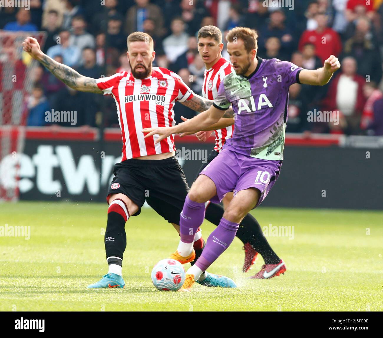 London, England - APRIL 23: Tottenham Hotspur's Harry Kane holds of Pontus Jansson of Brentford  during  Premier League between Brentford and Tottenha Stock Photo