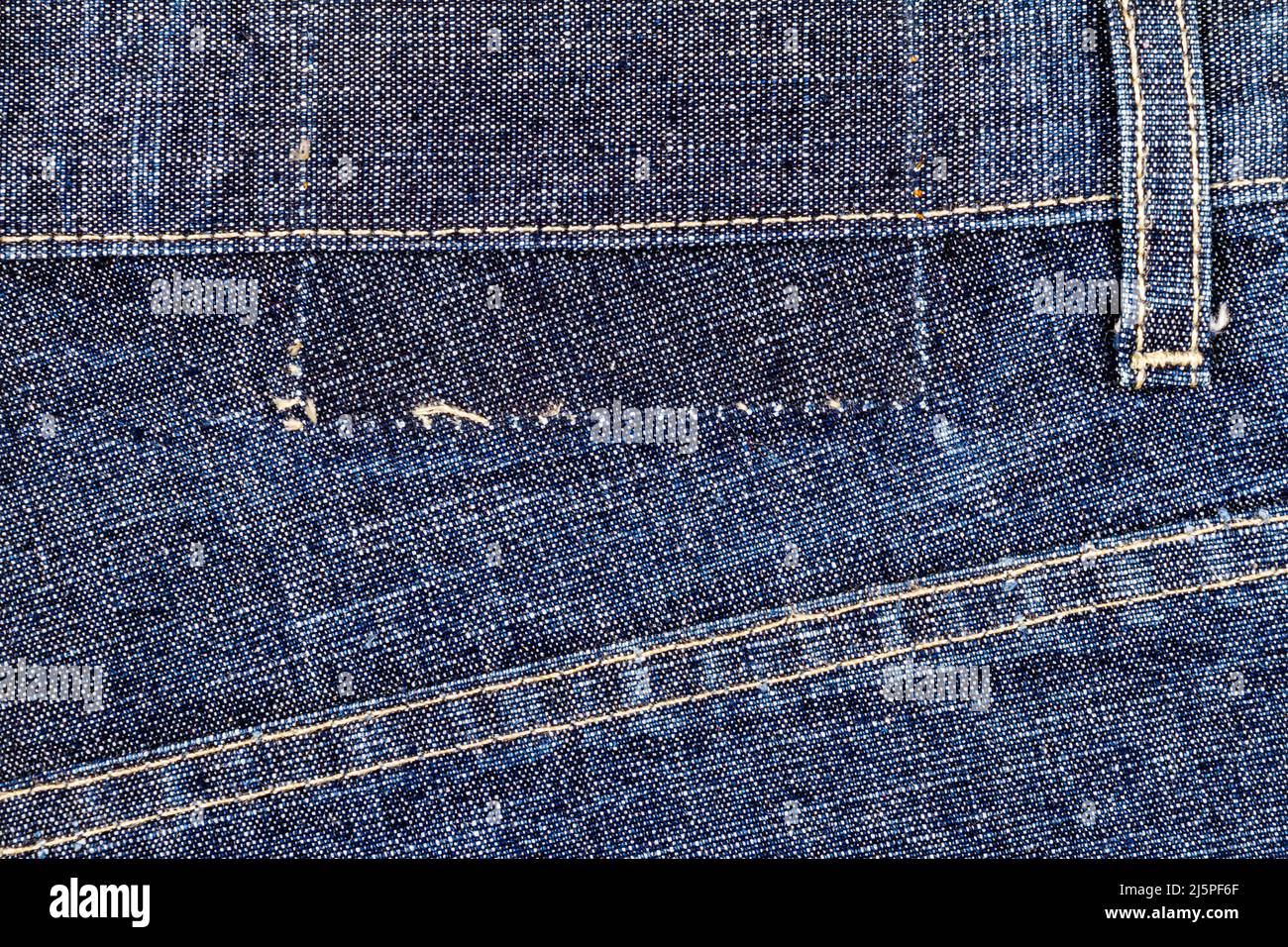 Worn blue denim jeans texture with stitch. Abstract jeans texture background Stock Photo