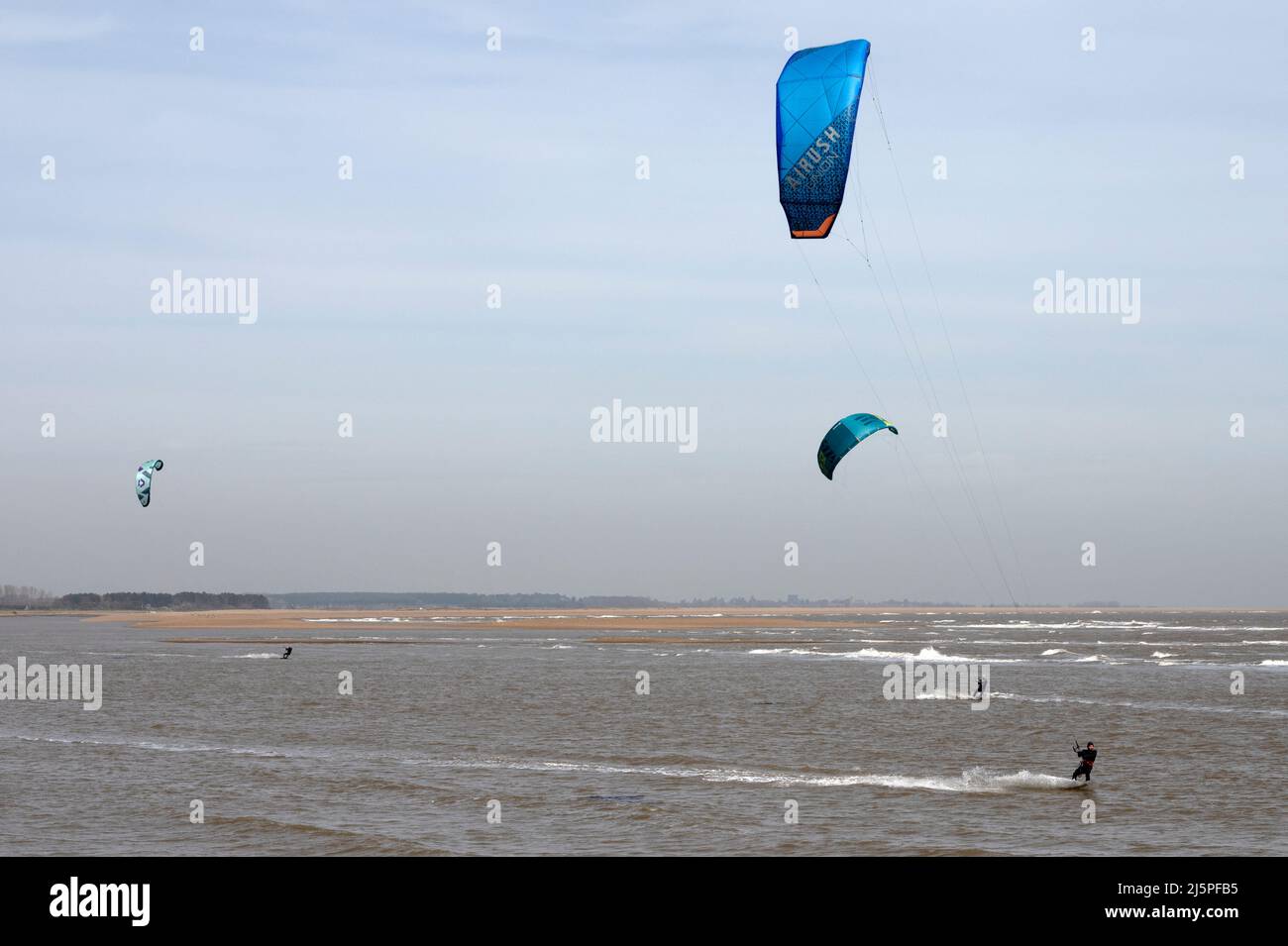 Kite surfers Shingle Street Suffolk UK Stock Photo