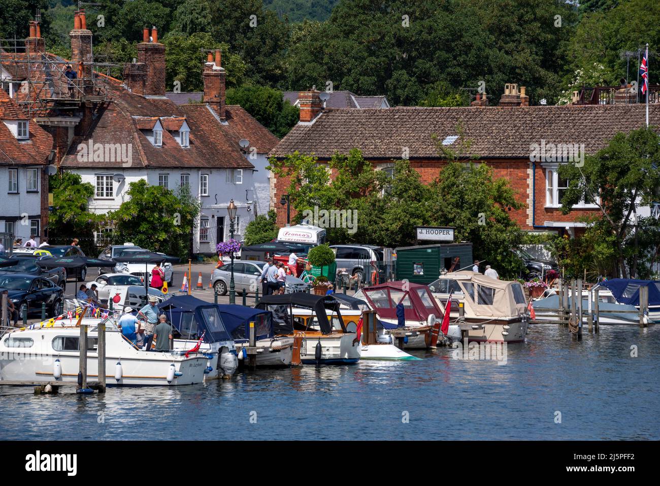 Boats moored on the attractive River Thames frontage during Henley