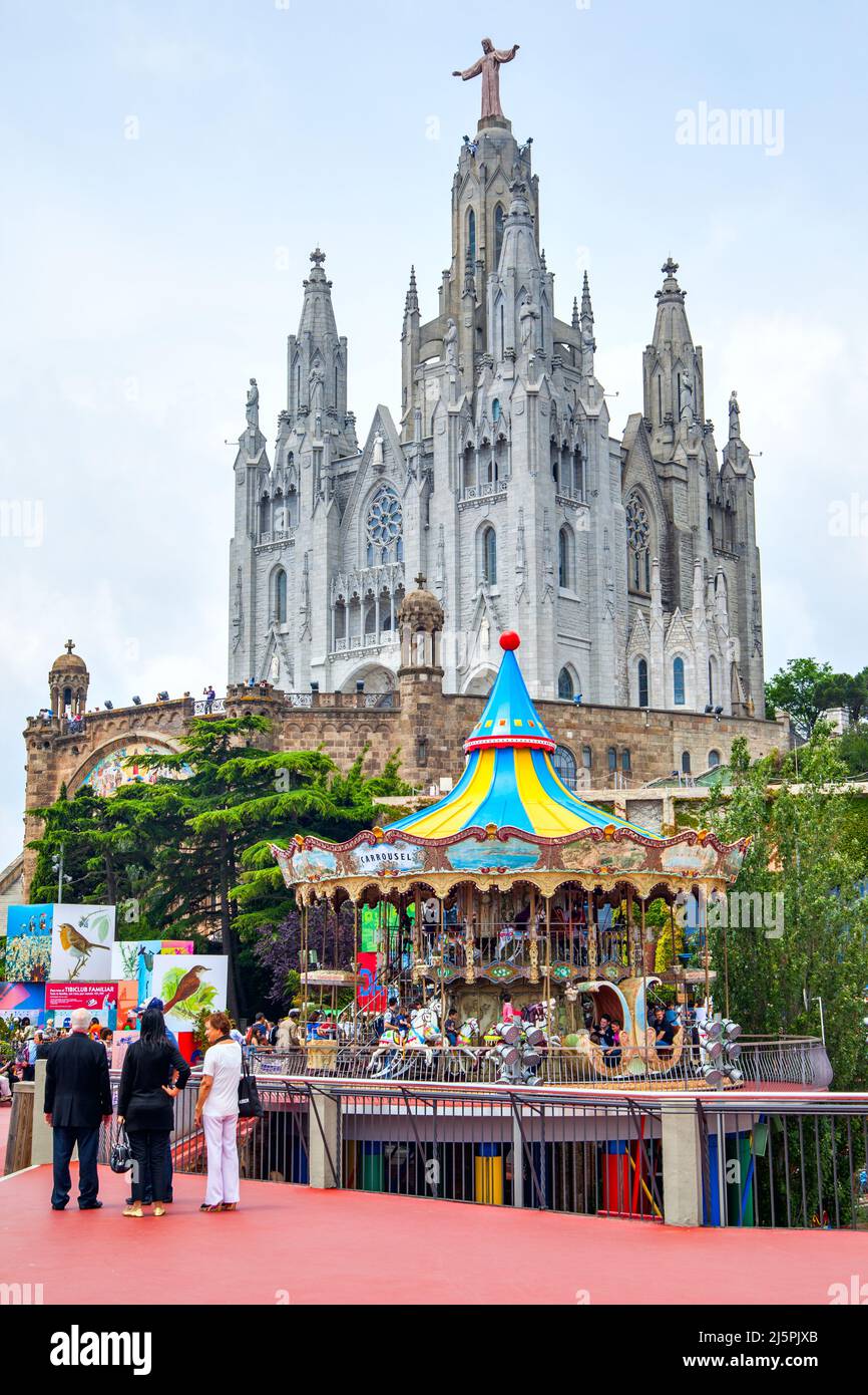 Barcelona, Spain - June 12, 2011:  Temple of the Sacred Heart of Jesus in Tibidabo and amusement park near by Stock Photo