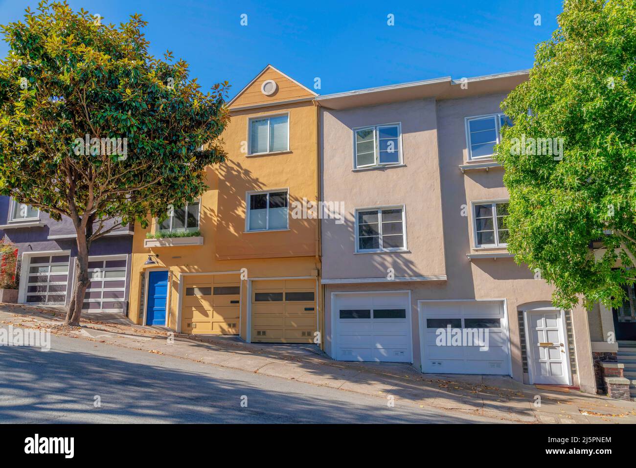 Townhouses on a sloped land area in San Francisco, California Stock ...