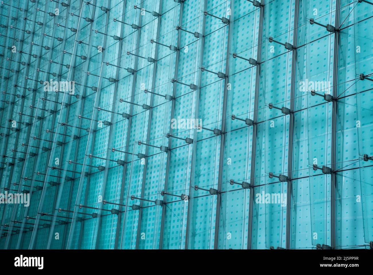 Modern architecture with a glass wall and vertically mounted glass