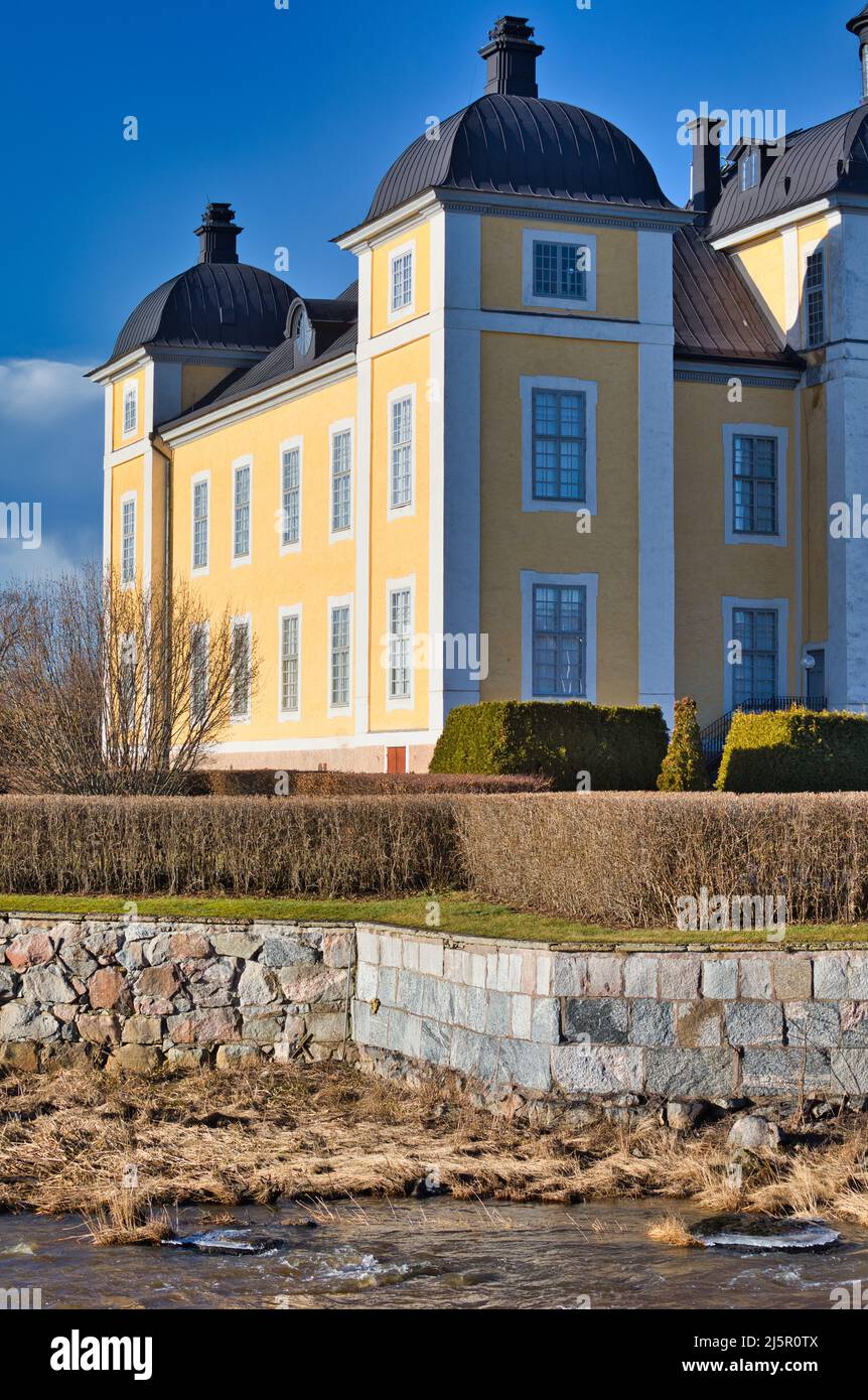 17th Century yellow baroque Stromsholm Palace castle, (Stromsholm Slott), Stromsholm, Vastmanland, Sweden Stock Photo