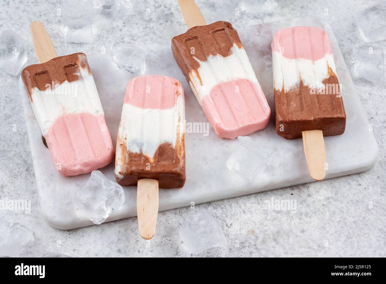 Neapolitan yogurt ice cream popsicle Stock Photo Alamy