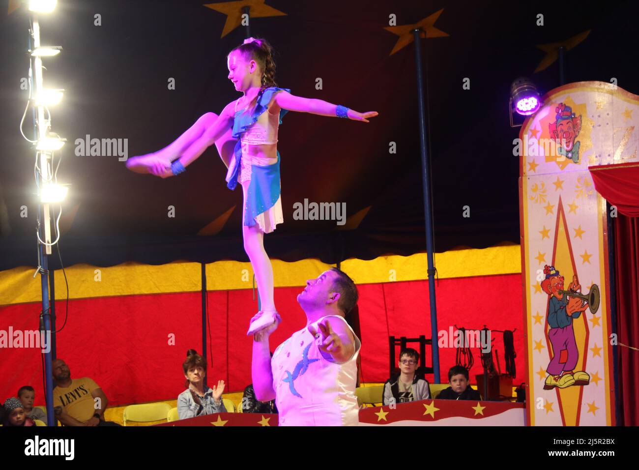 Members of Circus Trumpf entertaining with a presentation in Göttingen,  Germany on Sunday. All members of a family (Angelika Renz, Celina, Leroy,  Simon Renz, Daniela Lutzny and Milena) participate in this circus. (