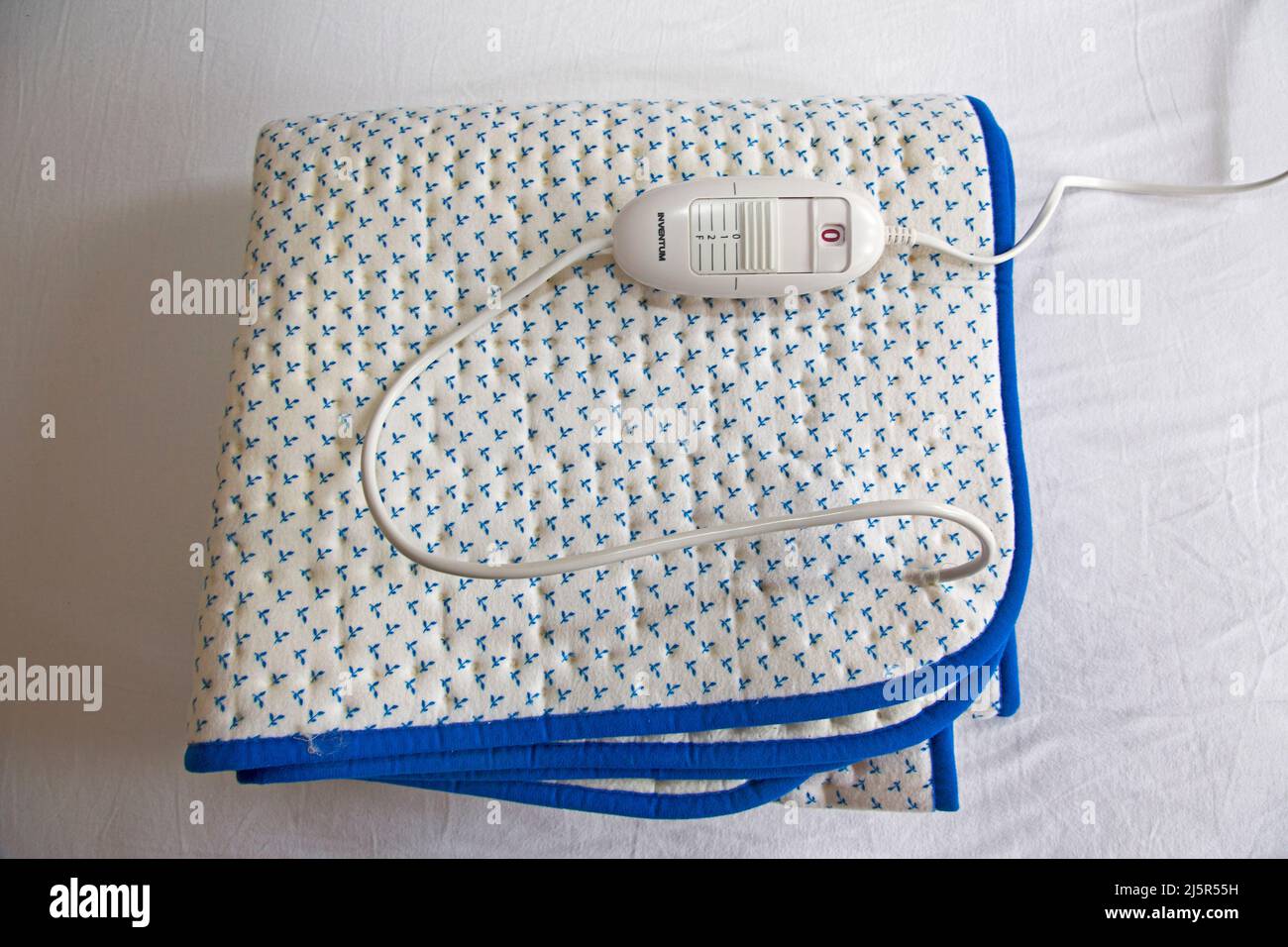 Electric blanket on a bed Stock Photo Alamy