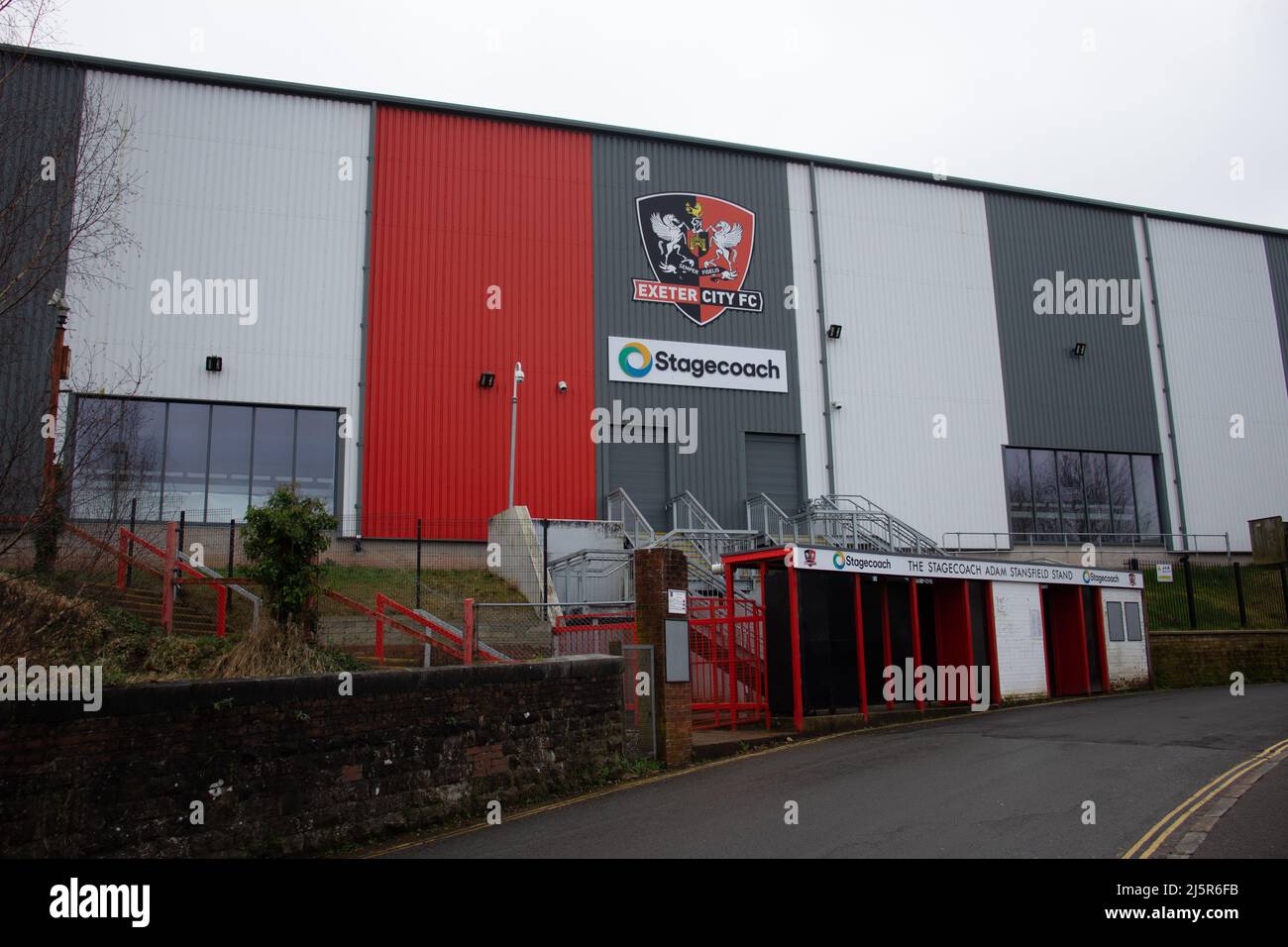 EXETER, UK - MARCH 3, 2021 CoVid-19 lockdown main gate and new stand for Exeter City FC, also known as the Grecians, playing at St James Park, stadium Stock Photo