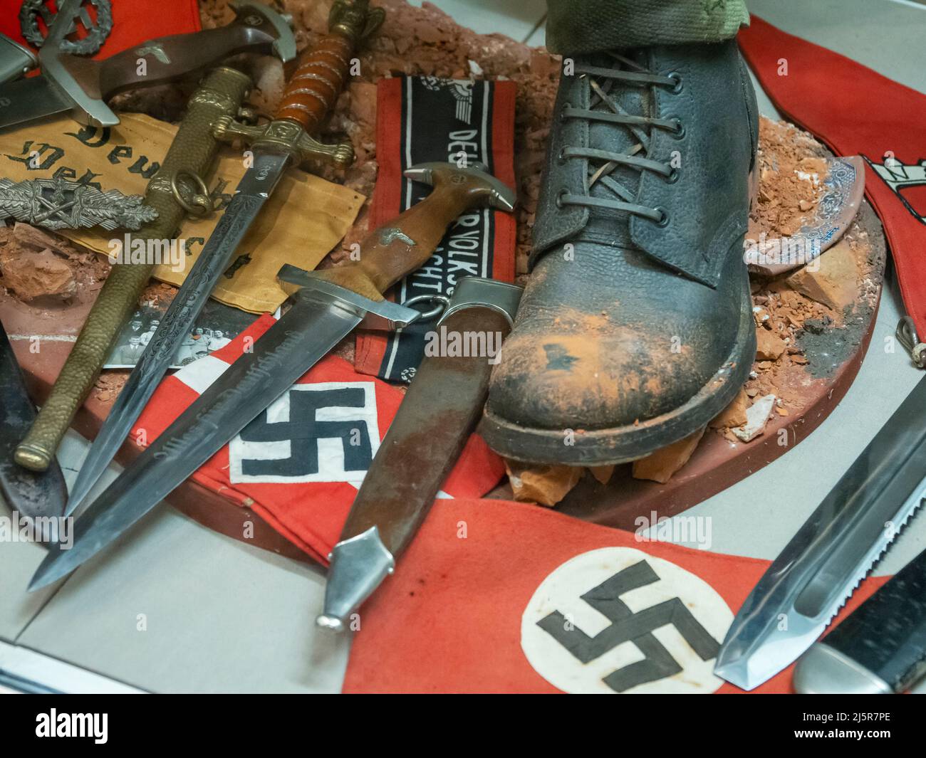 Captured Nazi paraphenalia in the museum at Caernarfon Castle, Caernarfon, Wales. Stock Photo
