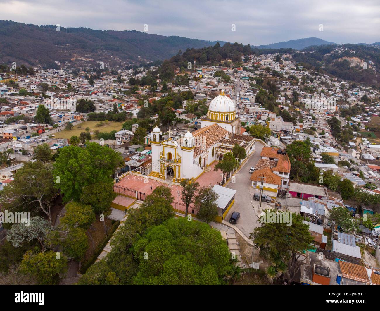 Aerial drone hsot of Guadalupe Church in San Cristobal de las Casas. Iglesia de Nuestra Senora de Guadalupe on the hill Stock Photo