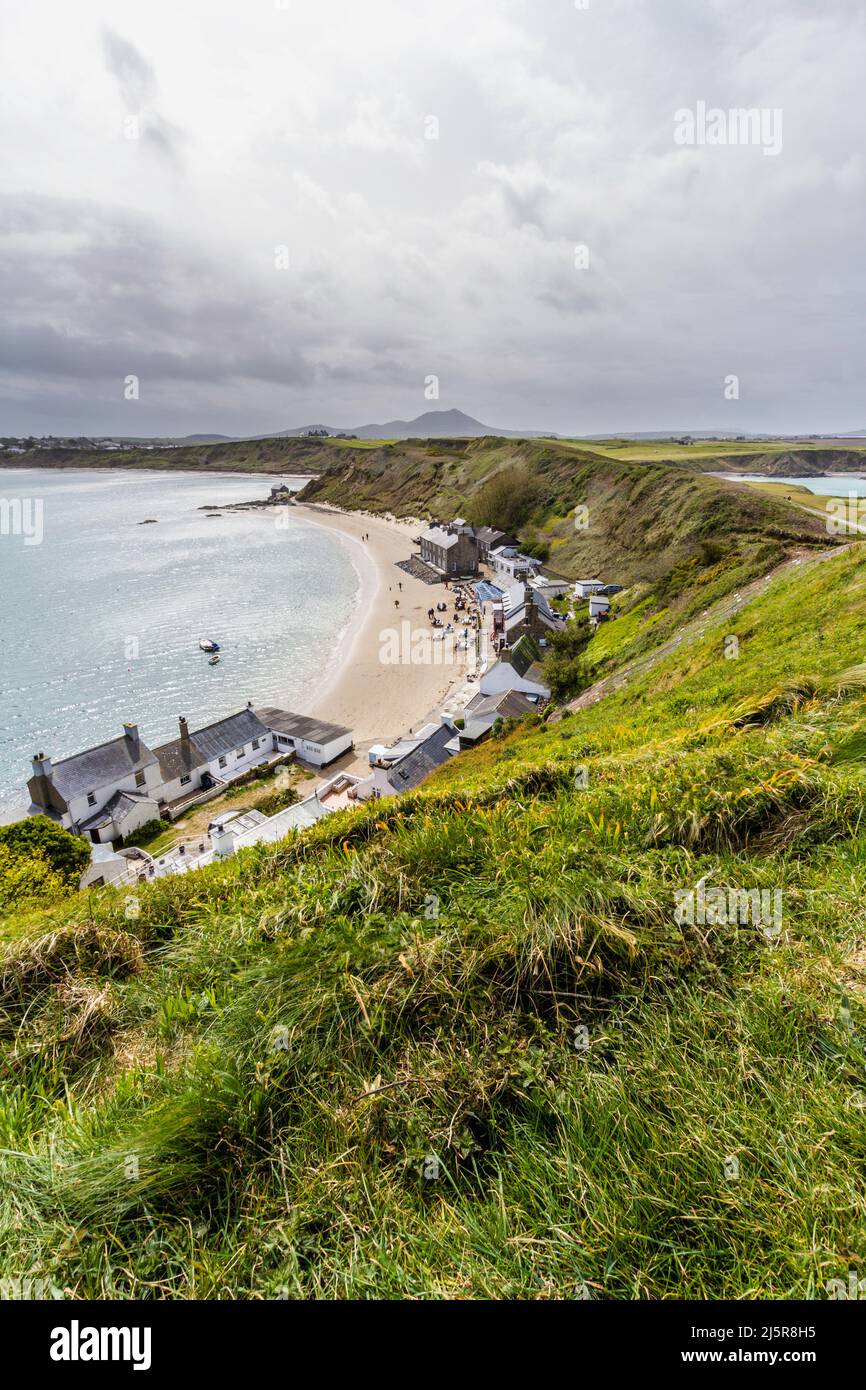 MORFA NEFYN, WALES UK – MAY 21: View over , in Porthdinllaen and the Ty Coch Inn, copyspace at top, Gwynedd, portrait, United Kingdom on May 9 2021 Stock Photo