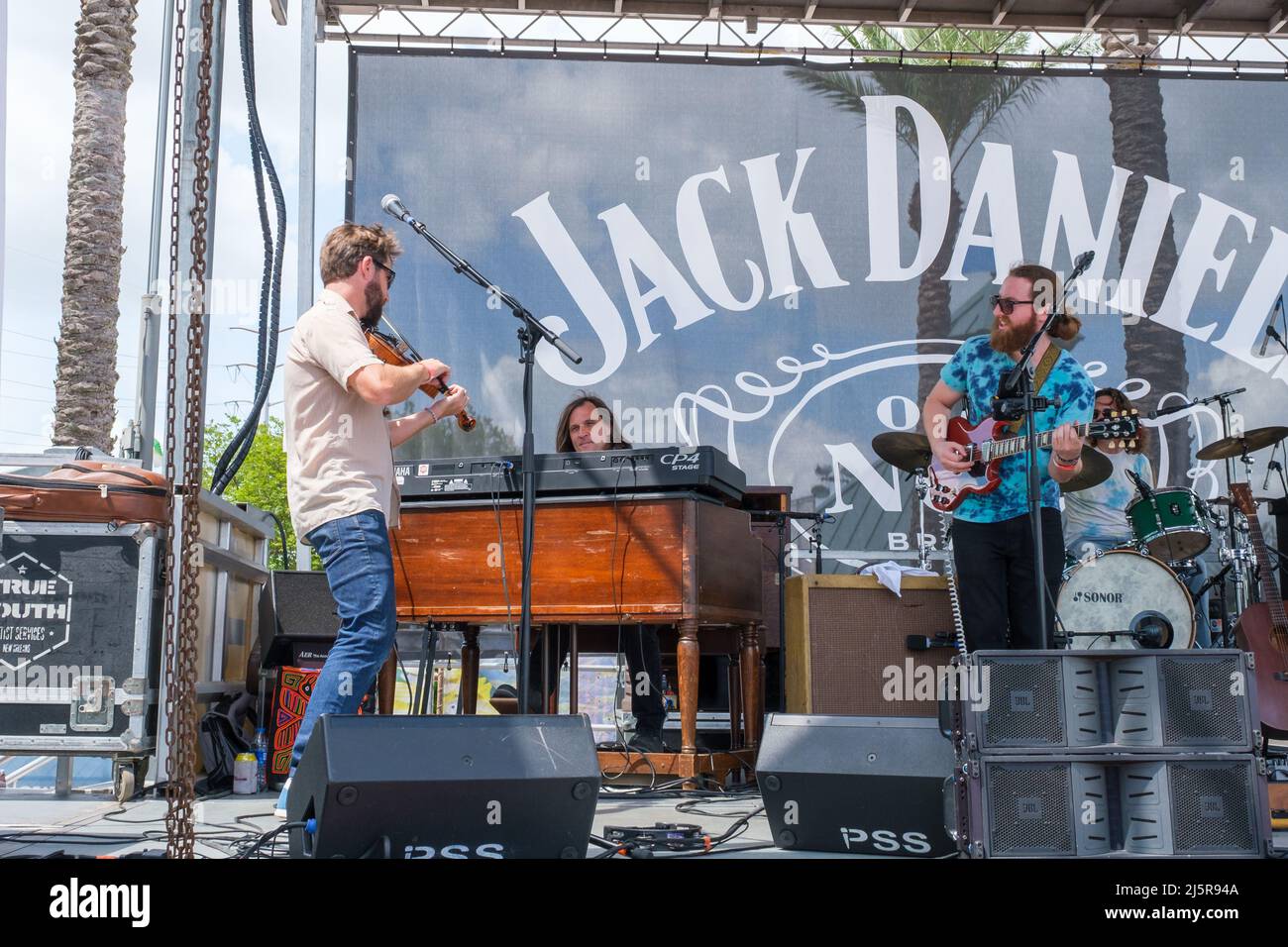 NEW ORLEANS, LA, USA - APRIL 21, 2022: Dave Jordan and the NIA jamming at the Jack Daniel's Stage at the French Quarter Festival (a free festival) Stock Photo